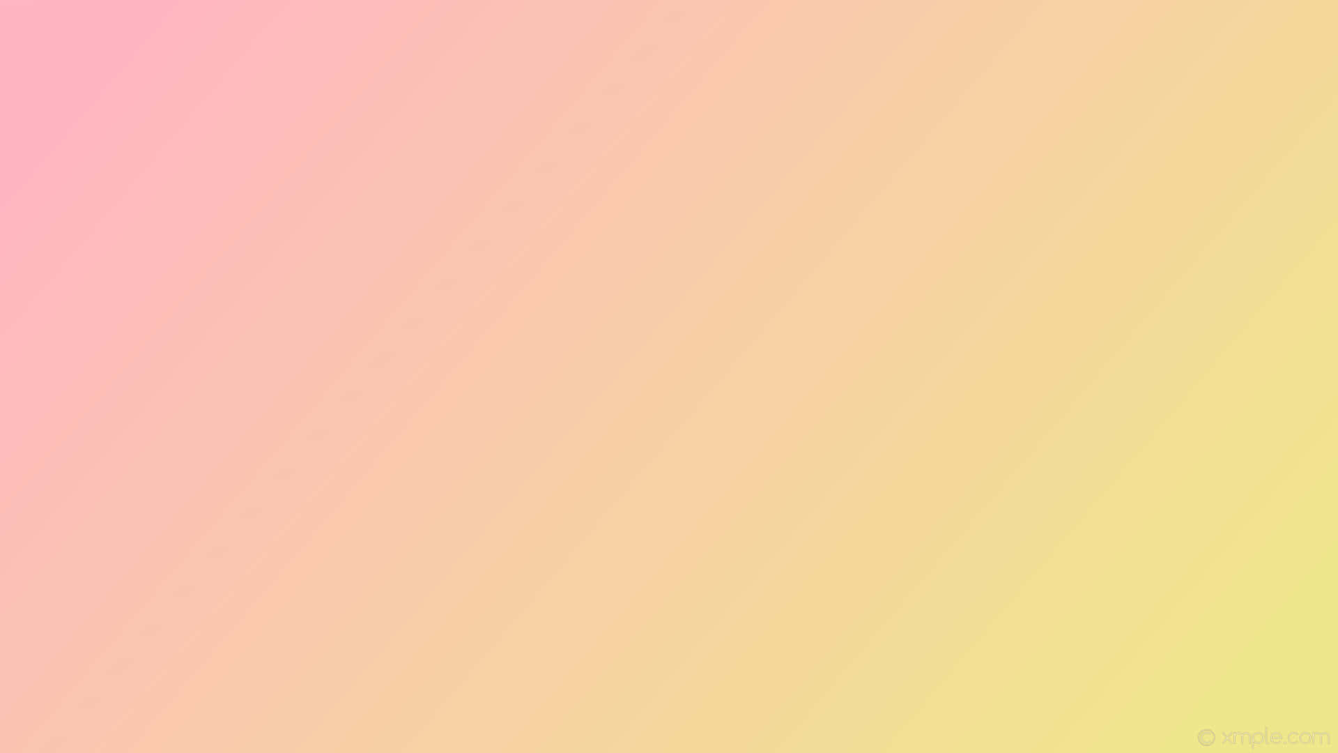Pastel Pink And Yellow 桌布 壁紙 — 柔和對角漸變，從粉彩粉紅到黃色，營造出溫柔舒緩的視覺流動。