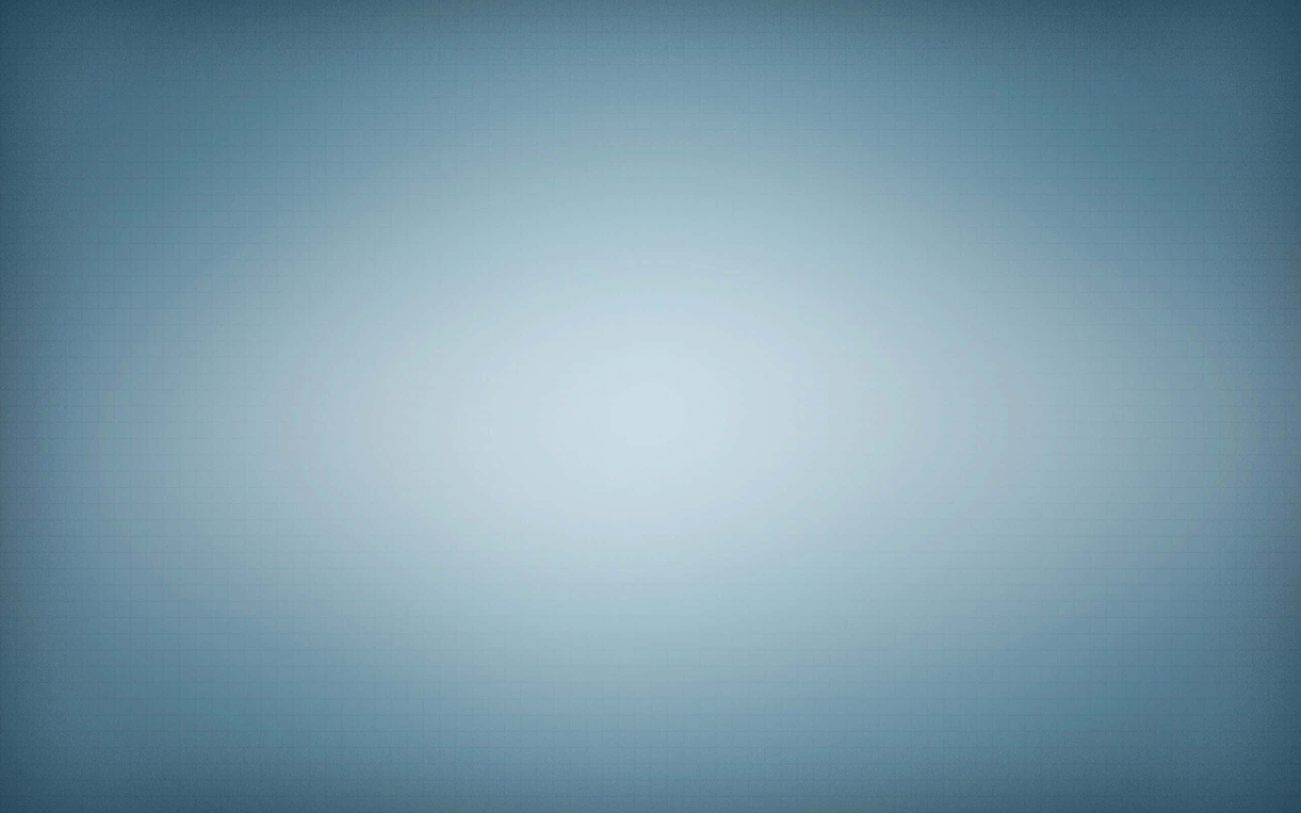 Faded 桌布 壁紙 — 柔和清涼的藍色調漸變至明亮的白色中心，營造出平靜的抽象背景。
