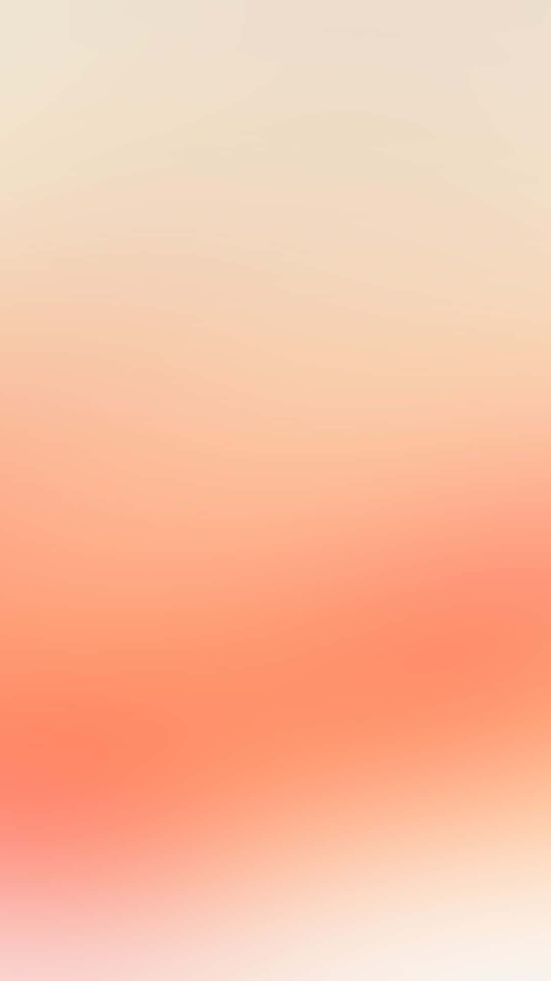Peach iPhone 桌布 壁紙 — 柔和漸層壁紙，從奶油米色過渡到溫暖珊瑚粉，帶有微妙的模糊紋理。