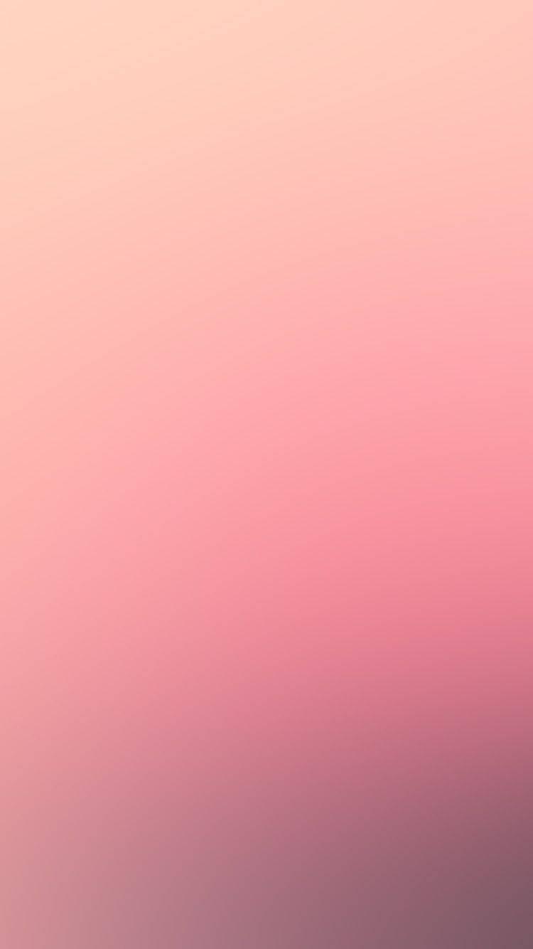 Pink Phone 桌布 壁紙 — 柔和漸層壁紙，從淡蜜桃色過渡到深玫瑰粉紅色，帶有細微紋理。