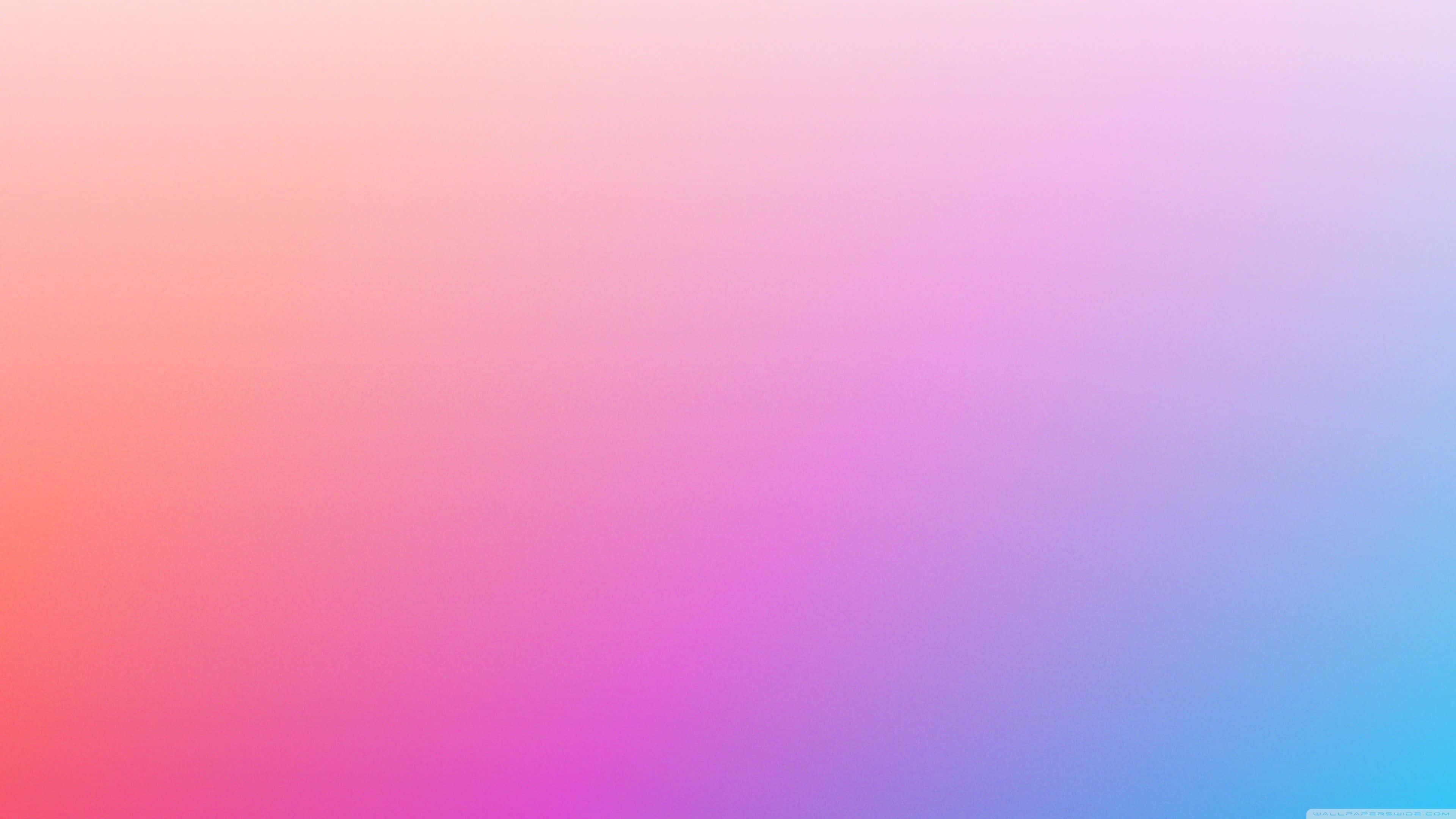 Pink And Blue 桌布 壁紙 — 柔和漸層桌布，將溫暖珊瑚色經洋紅色平滑過渡到清涼青色，營造夢幻效果。
