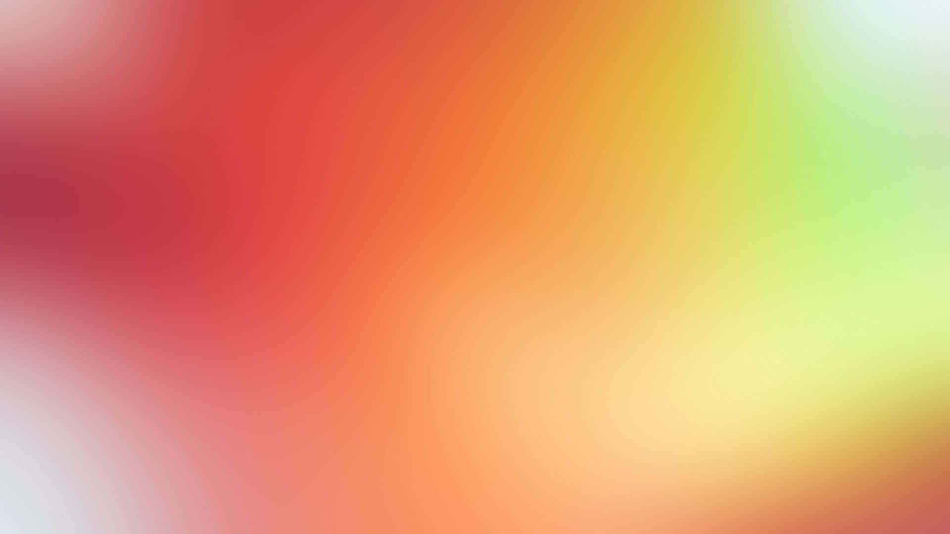 Yellow Abstract 桌布 壁紙 — 柔和漸變，暖色調的紅色、橙色和黃色融入冷色調的綠色和白色，營造出舒緩的抽象背景。