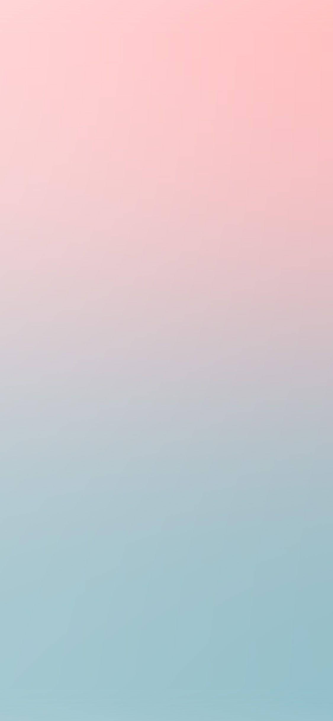 粉彩 iPhone 桌布 壁紙 — 柔和漸變壁紙，從粉紅色過渡到淺藍色，帶有微妙的幾何波浪圖案。