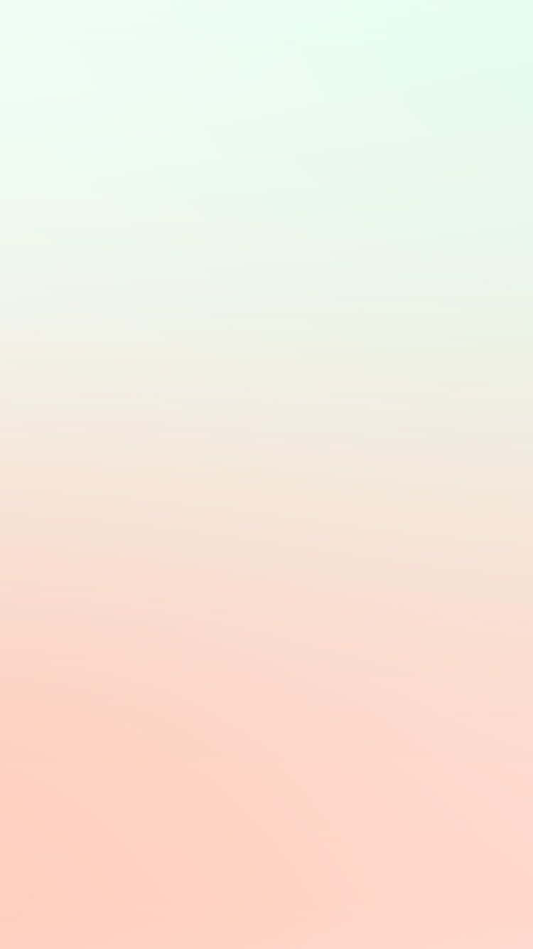 Gradient 桌布 壁紙 — 柔和漸變的天空從薄荷綠過渡到蜜桃粉，呈現寧靜極簡抽象場景。