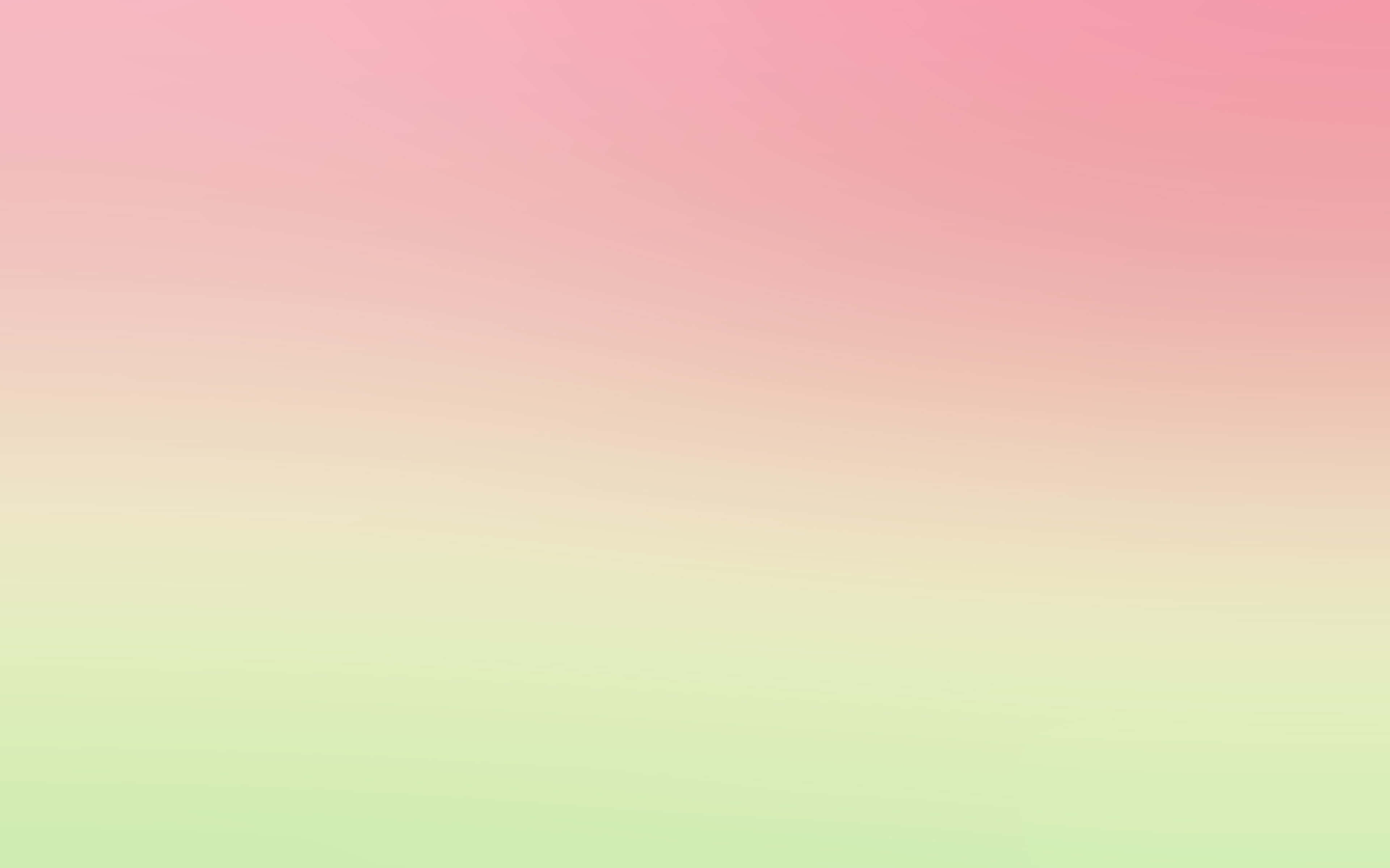 Pastel Pink And Yellow 桌布 壁紙 — 柔和漸變的天空由粉紅色過渡到淡綠色，營造出夢幻的粉彩背景。