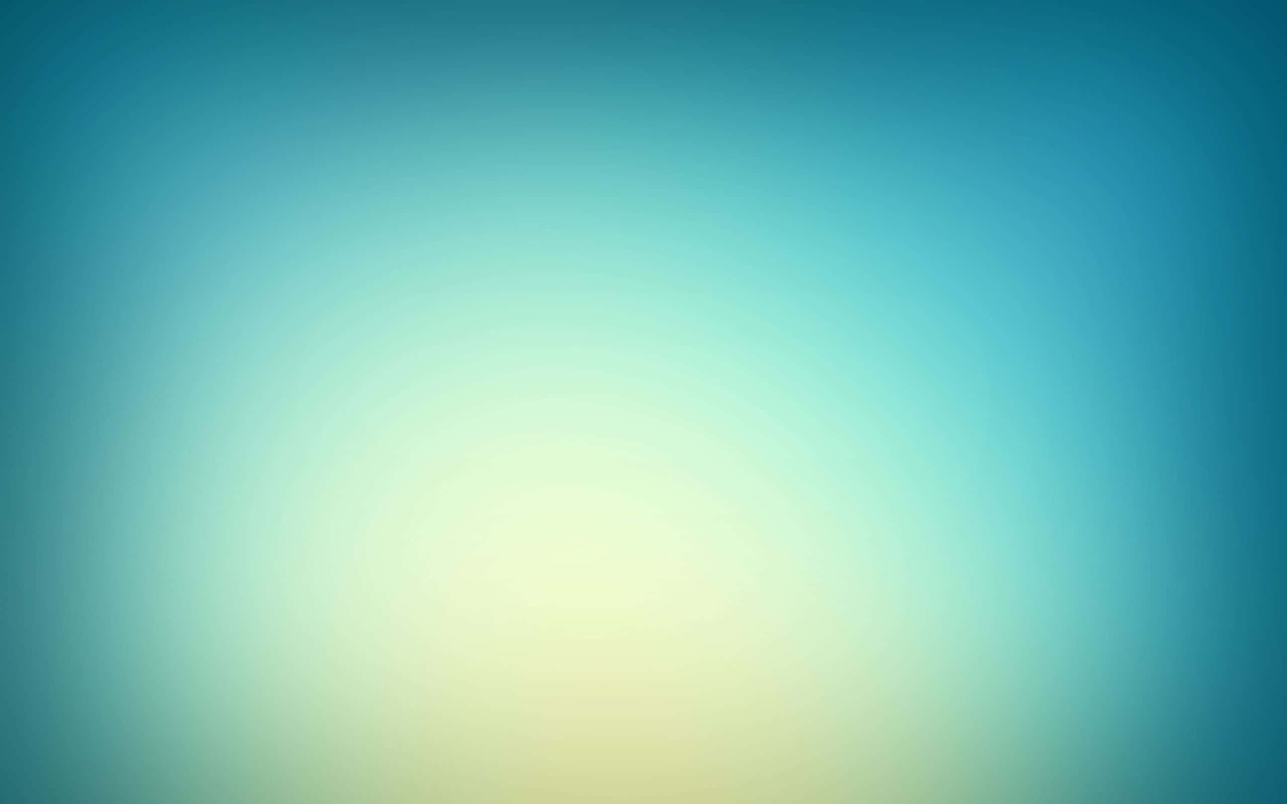 漸層 桌布 壁紙 — 柔和漸變背景，將藍綠色混合到溫暖的黃色中心。