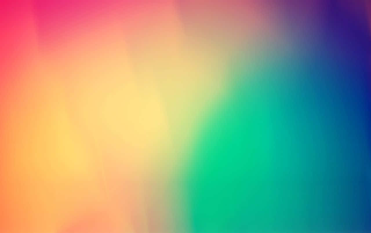 colors 桌布 壁紙 — 柔和漸變色調，暖粉紅與黃色融合成清涼的綠色與藍色，呈現夢幻般的抽象模糊效果。