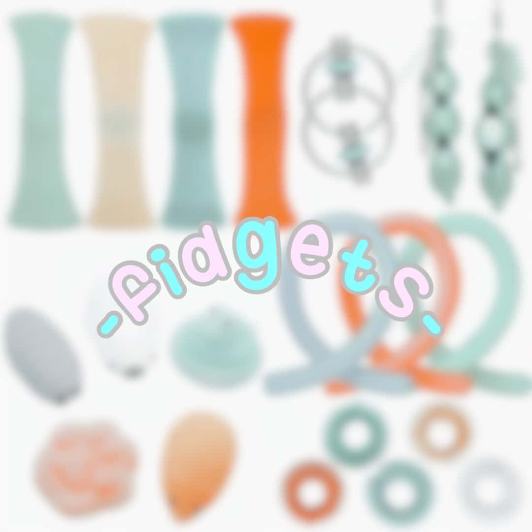 Pfp Aesthetic 桌布 壁紙 — 柔和焦點的彩色減壓玩具系列，以粉彩色調排列在白色背景上。