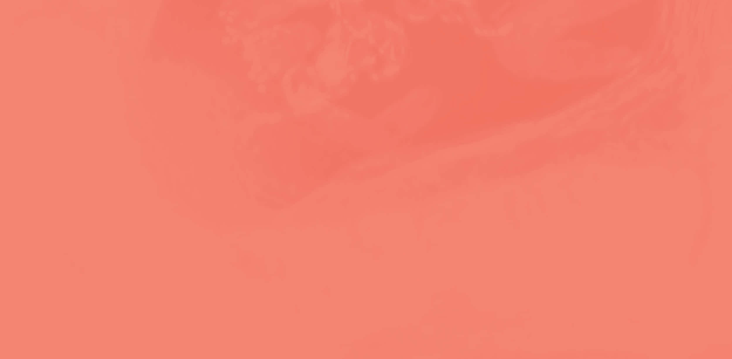 Pastel Red 桌布 壁紙 — 柔和珊瑚漸變背景，帶有細膩的抽象筆觸紋理。