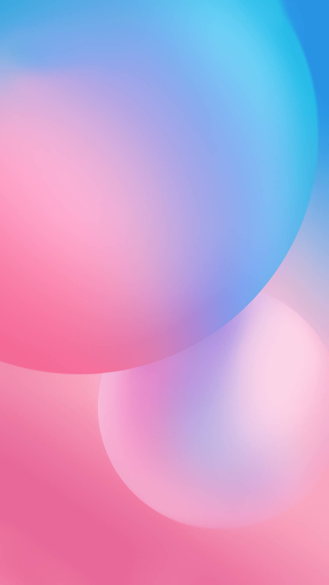 Circle 桌布 壁紙 — 柔和發光的粉彩粉紅和藍色球體融入夢幻漸變背景中。