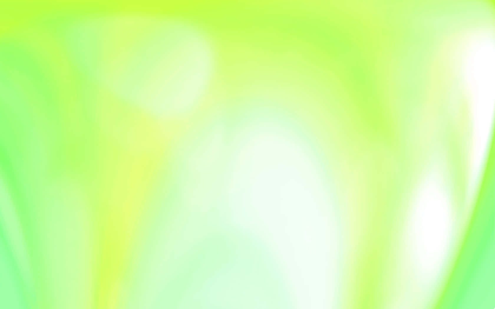 Light Green 桌布 壁紙 — 柔和發光的萊姆綠色和淡黃色漸變，帶有模糊的光線條紋，營造出夢幻般的抽象背景。
