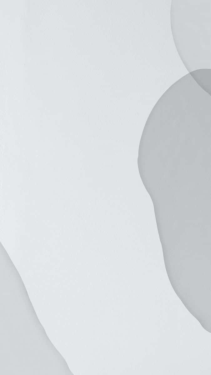 Light Gray iPhone 桌布 壁紙 — 柔和的抽象形狀以柔和灰色色調流過極簡紋理背景。