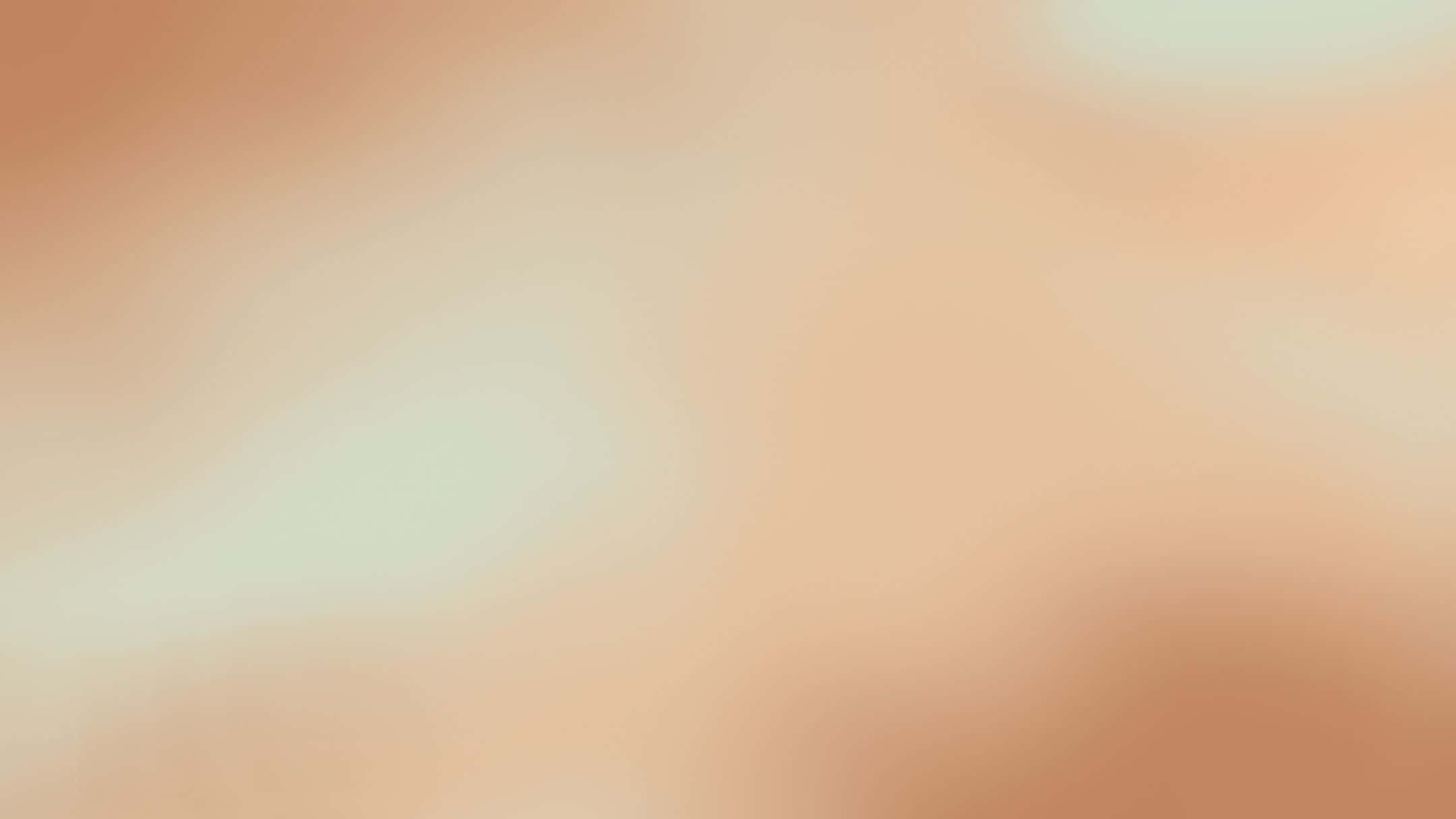 Pastel Vintage 桌布 壁紙 — 柔和的桃色和奶油漸變色，加上微妙的光漩渦，營造出平靜的抽象背景。