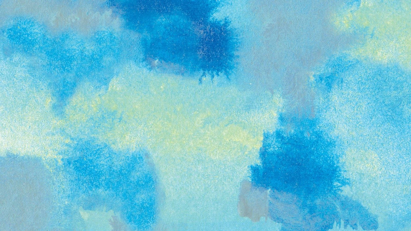 Splatter Paint 桌布 壁紙 — 柔和的水彩洗滌，藍色和淡黃色融合成抽象的雲狀形態，帶有紋理筆觸。