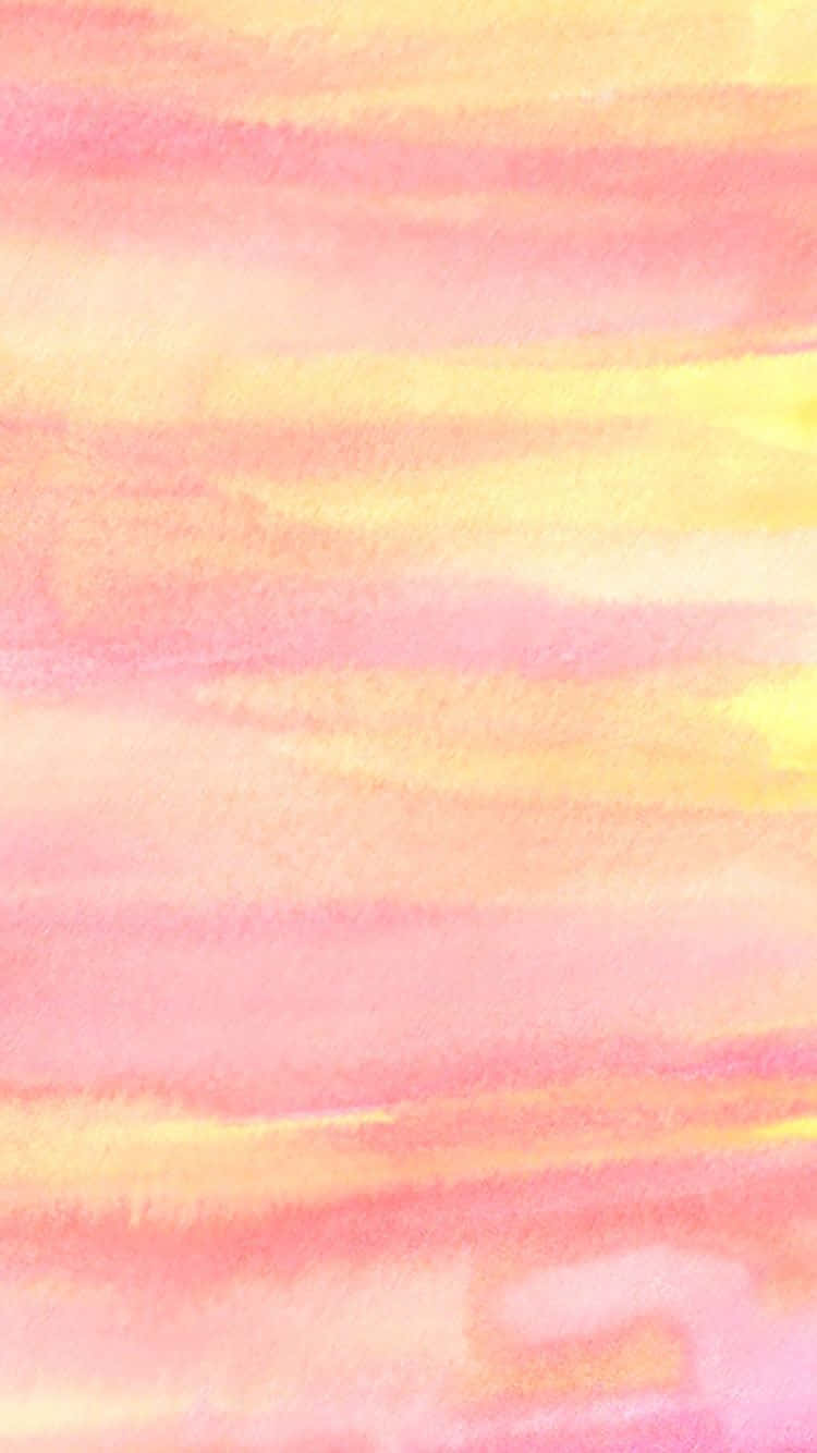 Pastel Pink And Yellow 桌布 壁紙 — 柔和的水彩洗滌將粉紅色、黃色和桃色以溫柔的水平筆觸混合，營造出夢幻般的抽象背景。