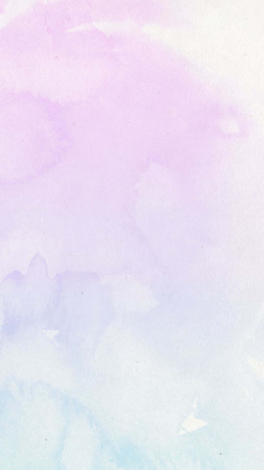Watercolor 桌布 壁紙 — 柔和的水彩洗滌將薰衣草紫和淡藍色混合在有紋理的紙上，營造出夢幻空靈的背景。