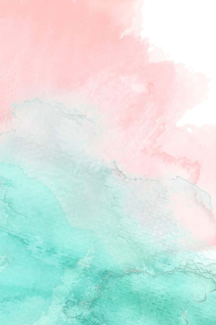Pink And Teal 桌布 壁紙 — 柔和的水彩洗滌混合粉紅色和藍綠色，形成帶有細膩紋理的夢幻抽象漸變。