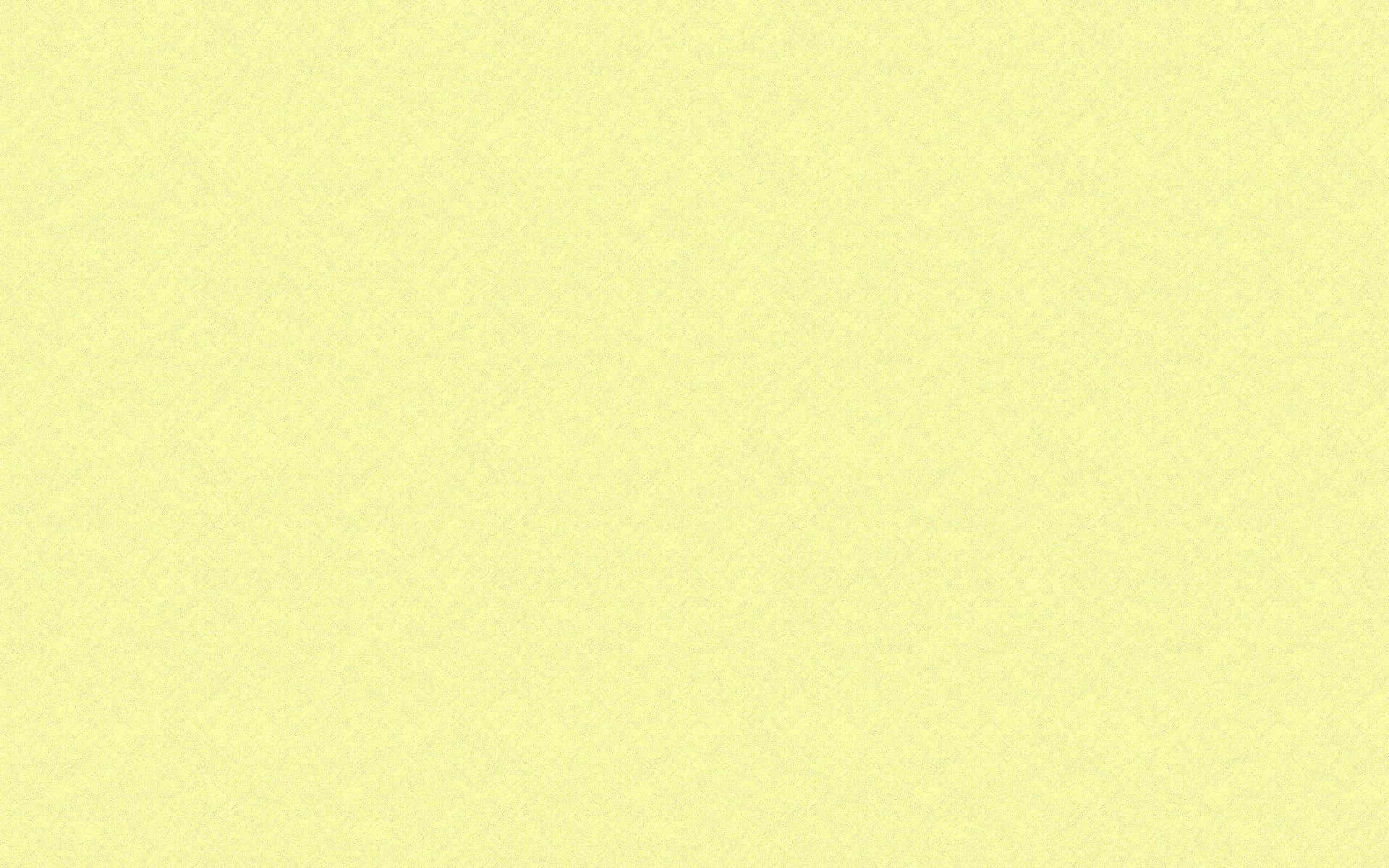 Pale Yellow 桌布 壁紙 — 柔和的淡黃色紋理背景，帶有微妙的顆粒圖案和均勻的照明。