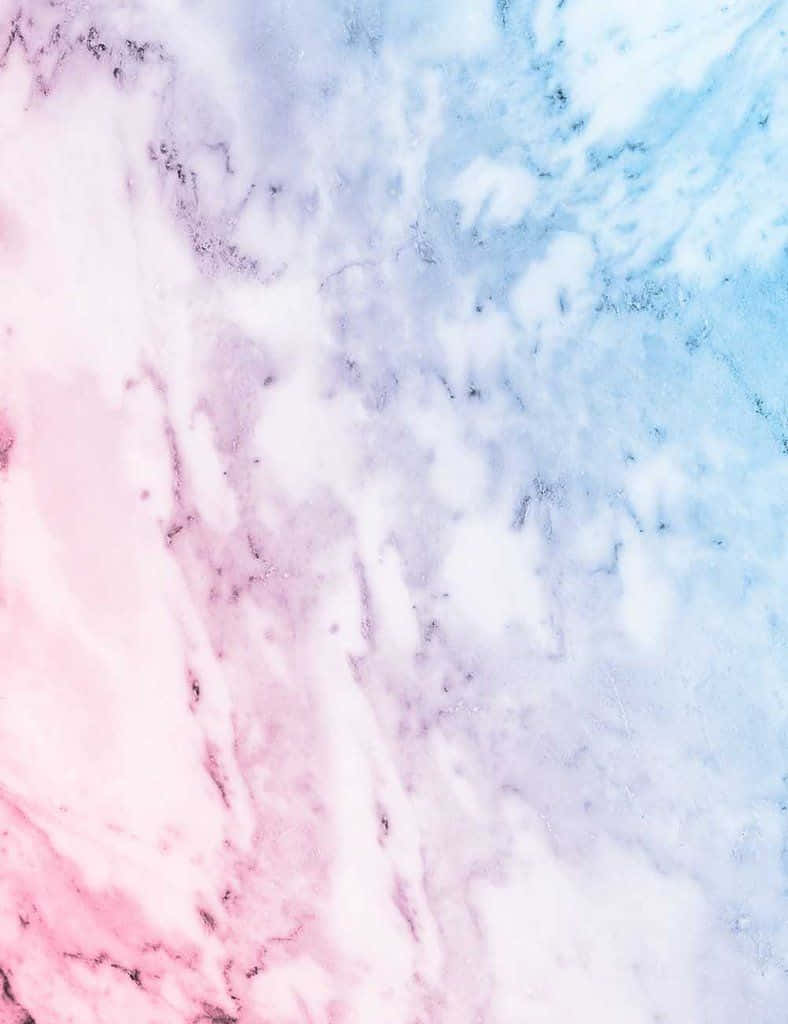 Pastel Blue And Pink 桌布 壁紙 — 柔和的粉彩大理石漩渦混合了粉紅色、薰衣草色和天藍色，形成一個夢幻的抽象圖案。