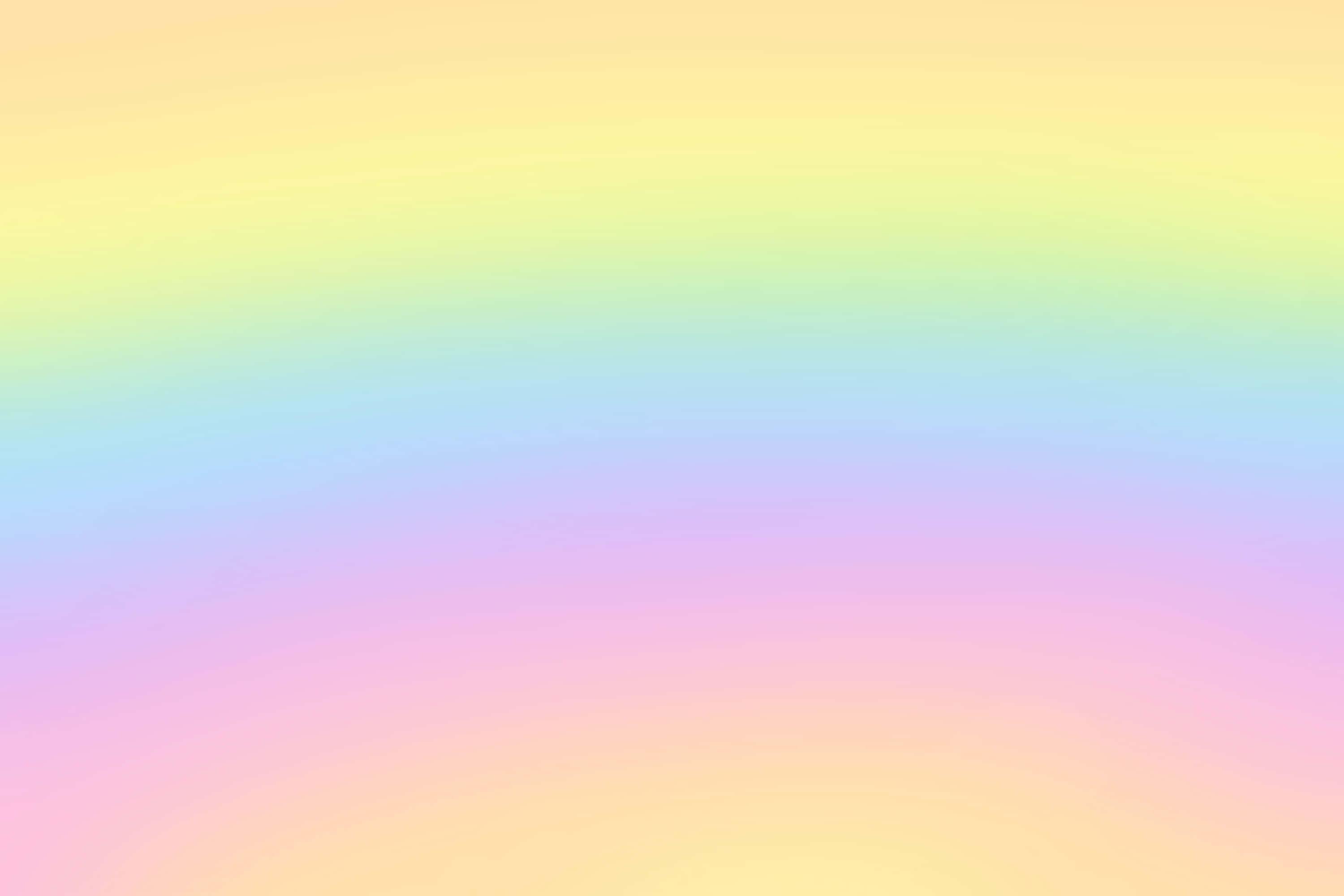 Pastel Gradient 桌布 壁紙 — 柔和的粉彩彩虹漸層從黃色平滑過渡到粉紅色，覆蓋整個畫面。