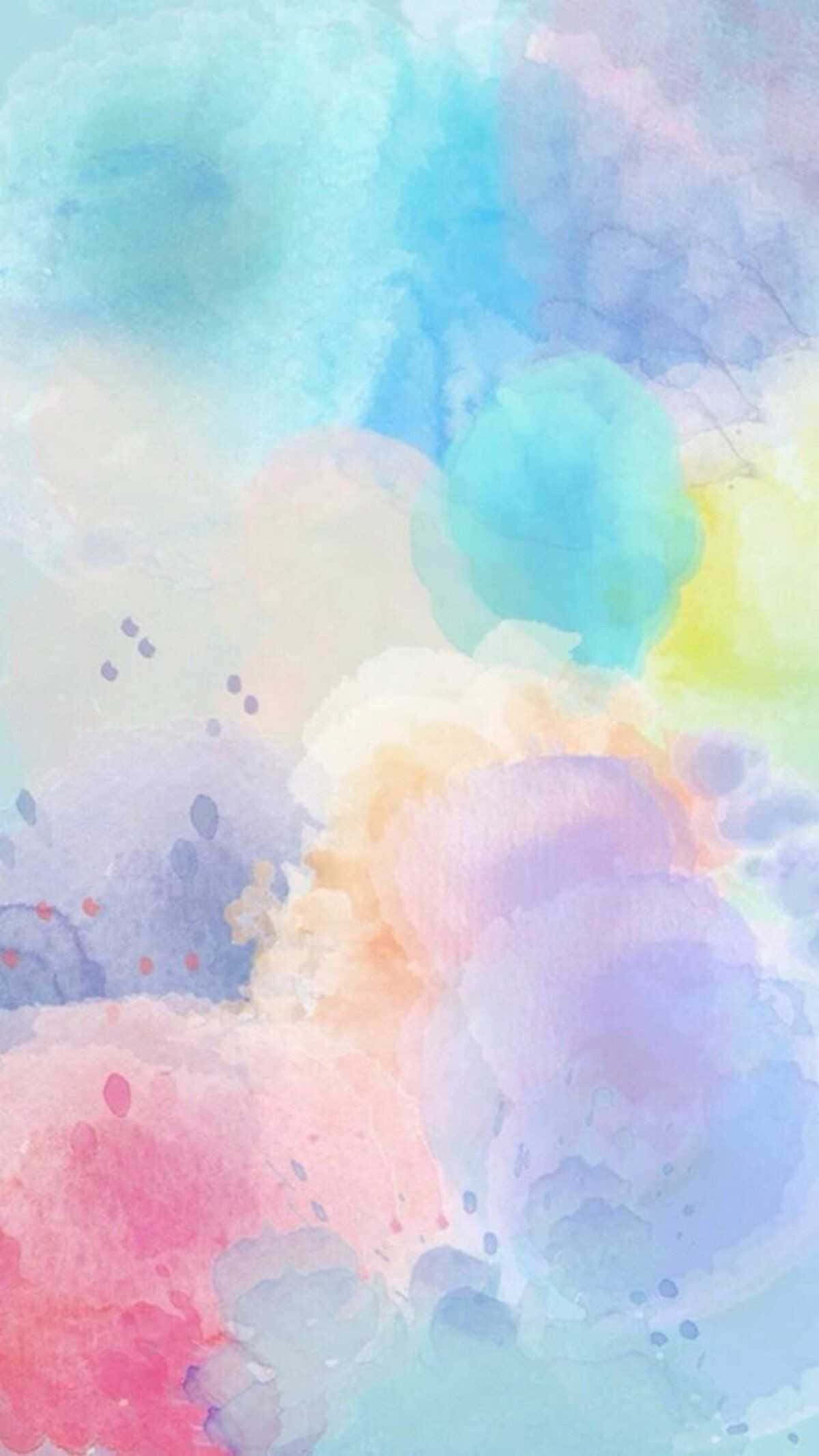 桌布 壁紙 — 柔和的粉彩水彩斑點在粉紅、藍、黃和薰衣草色的溫柔漩渦中混合，帶有散落的墨水濺點。