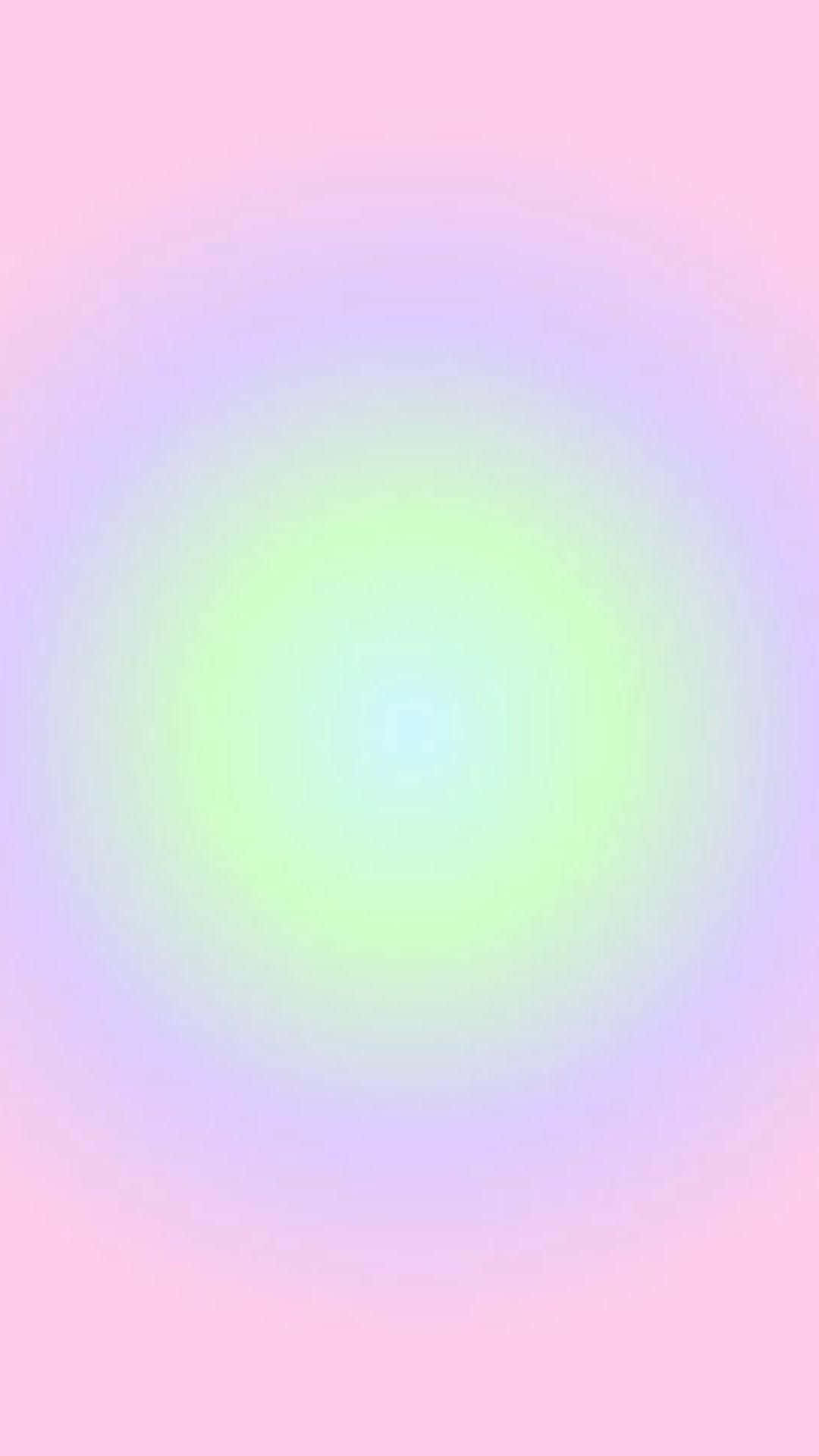 Aura 桌布 壁紙 — 柔和的粉彩漸變從發光的綠色中心向外擴散，形成粉紅色和薰衣草色的柔和圓形波浪。