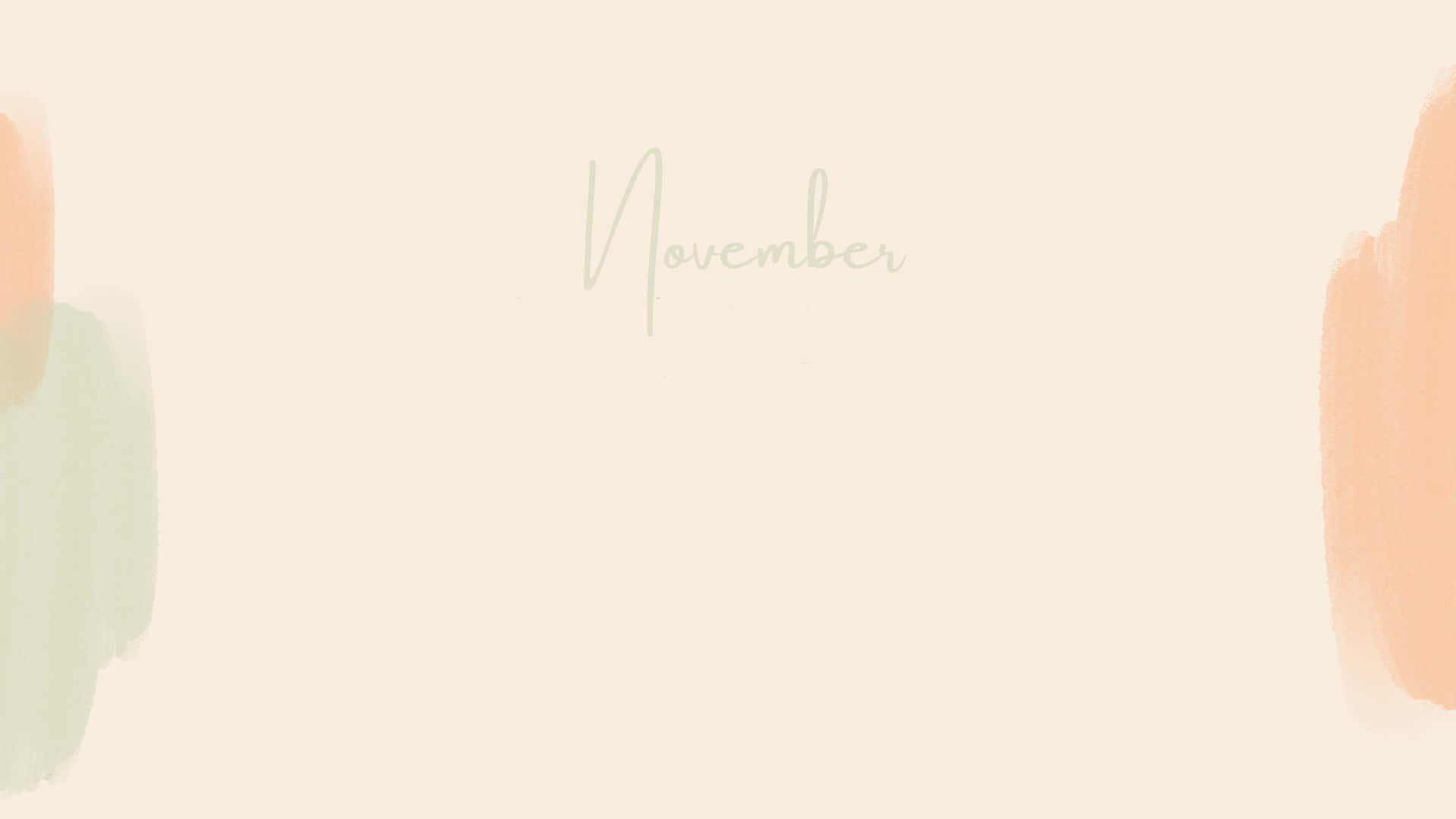 Aesthetic November 桌布 壁紙 — 柔和的粉彩筆觸在奶油色背景上以優雅的手寫體框住「November」這個詞。