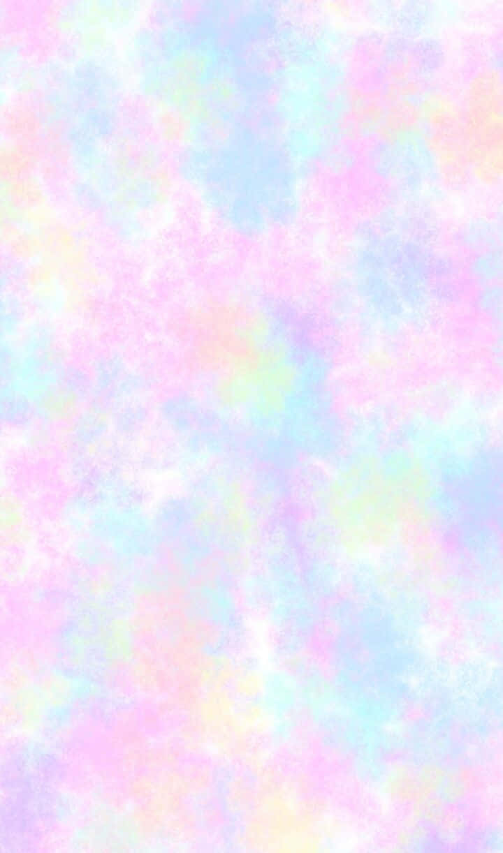 pastel 桌布 壁紙 — 柔和的粉彩雲朵在溫柔的粉紅、藍色和黃色中旋轉，營造出夢幻空靈的氛圍。