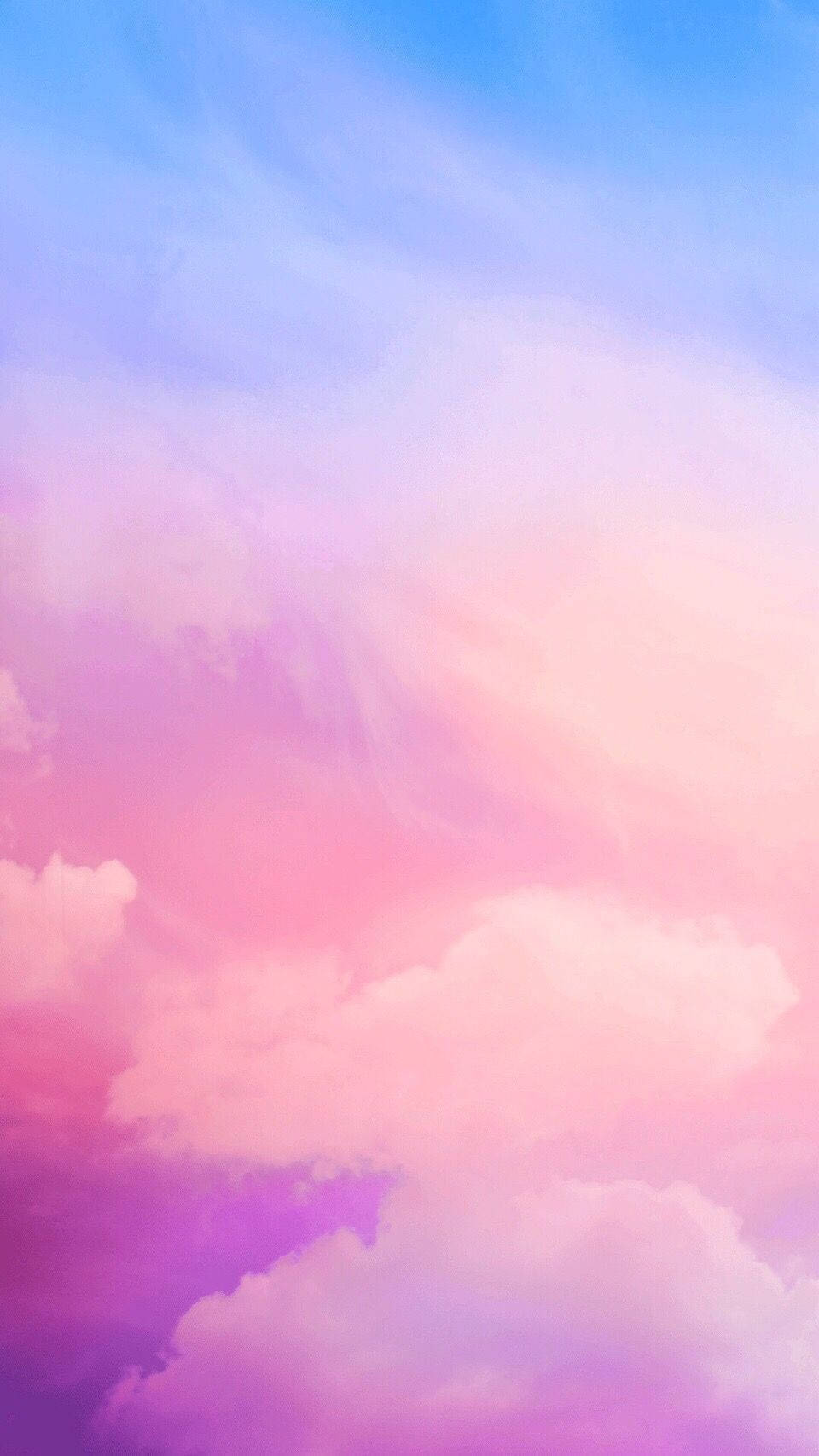 Cute Pink Cloud 桌布 壁紙 — 柔和的粉彩雲朵飄過夢幻般的天空，融合了粉紅色、紫色和藍色色調。