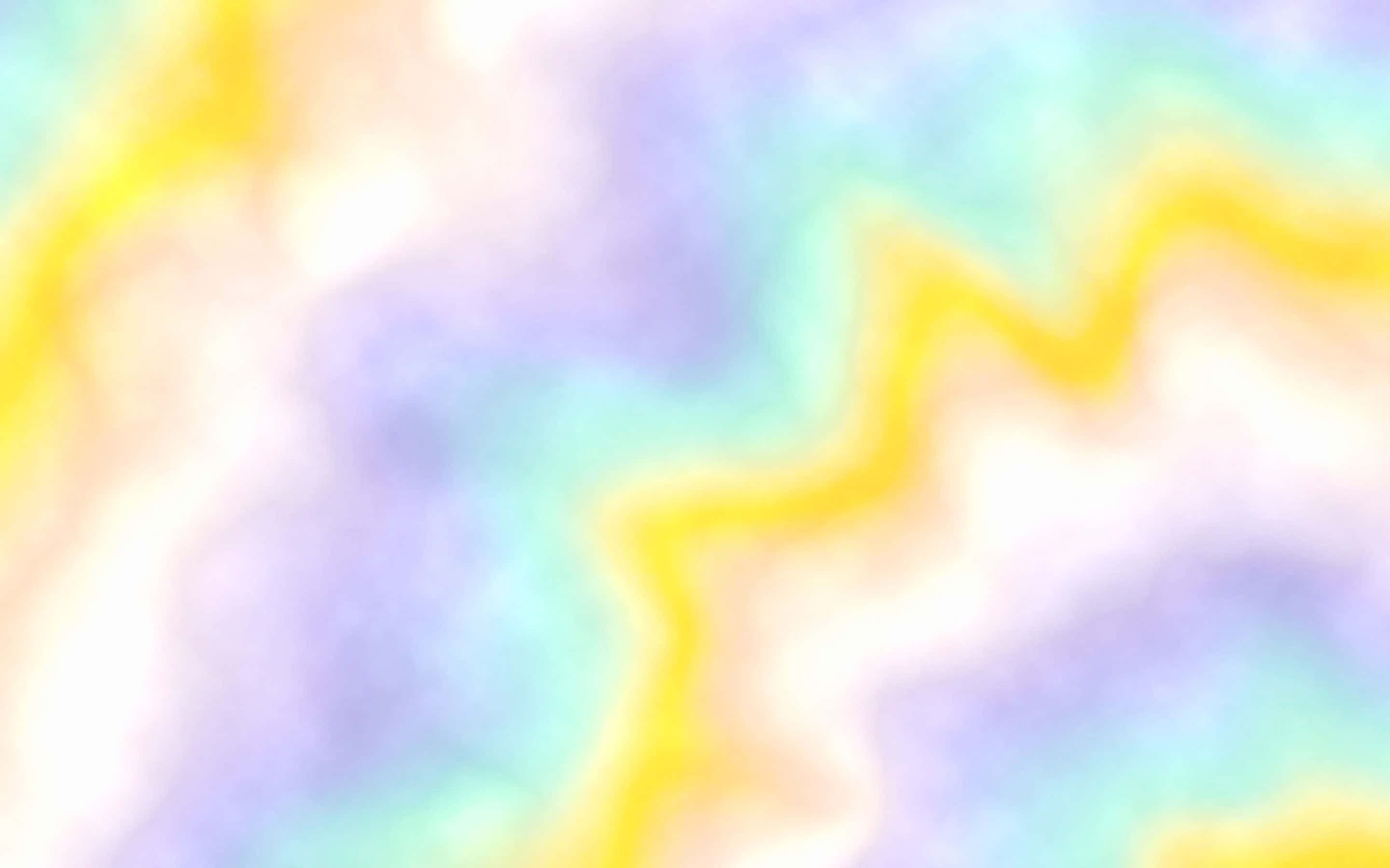 Pastel Tie Dye 桌布 壁紙 — 柔和的粉彩顏色在溫柔的波浪中融合，創造出一個充滿黃色和薰衣草色調的夢幻抽象背景。