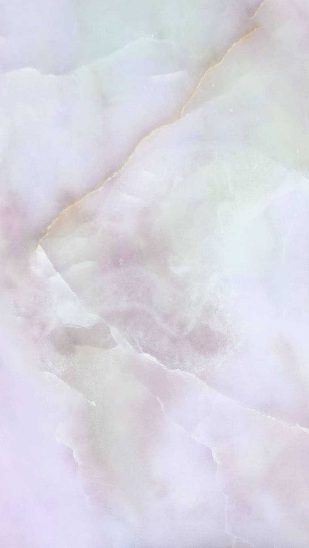iPhone 桌布 壁紙 — 柔和的粉紅色和白色大理石，帶有微妙的金色紋理流經其光滑表面。