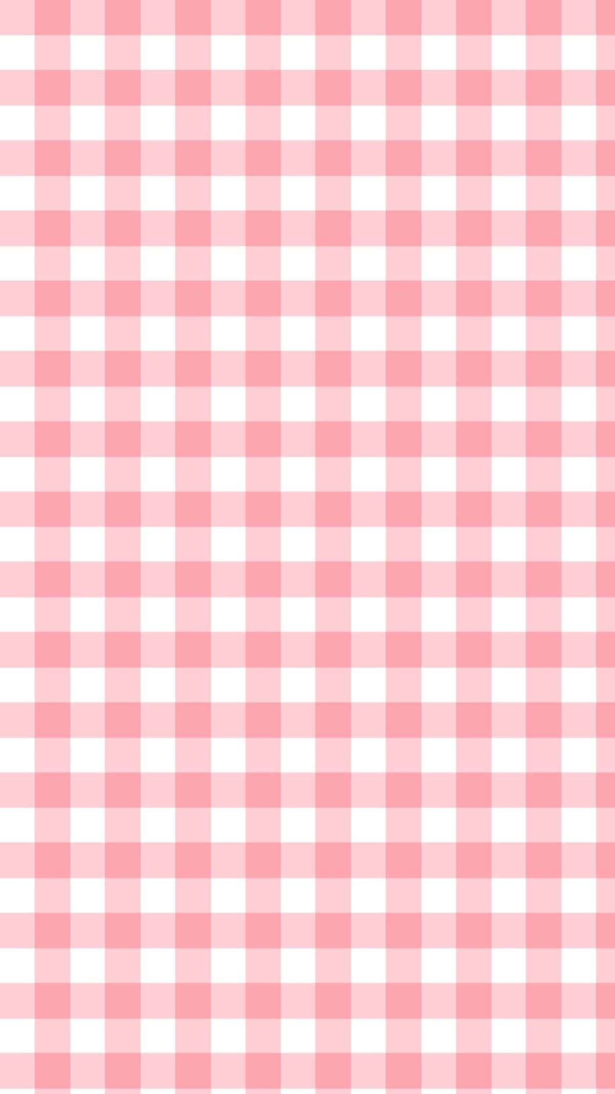 Pink Grid 桌布 壁紙 — 柔和的粉紅色和白色格紋圖案以整潔的重複網格填滿整個畫面。