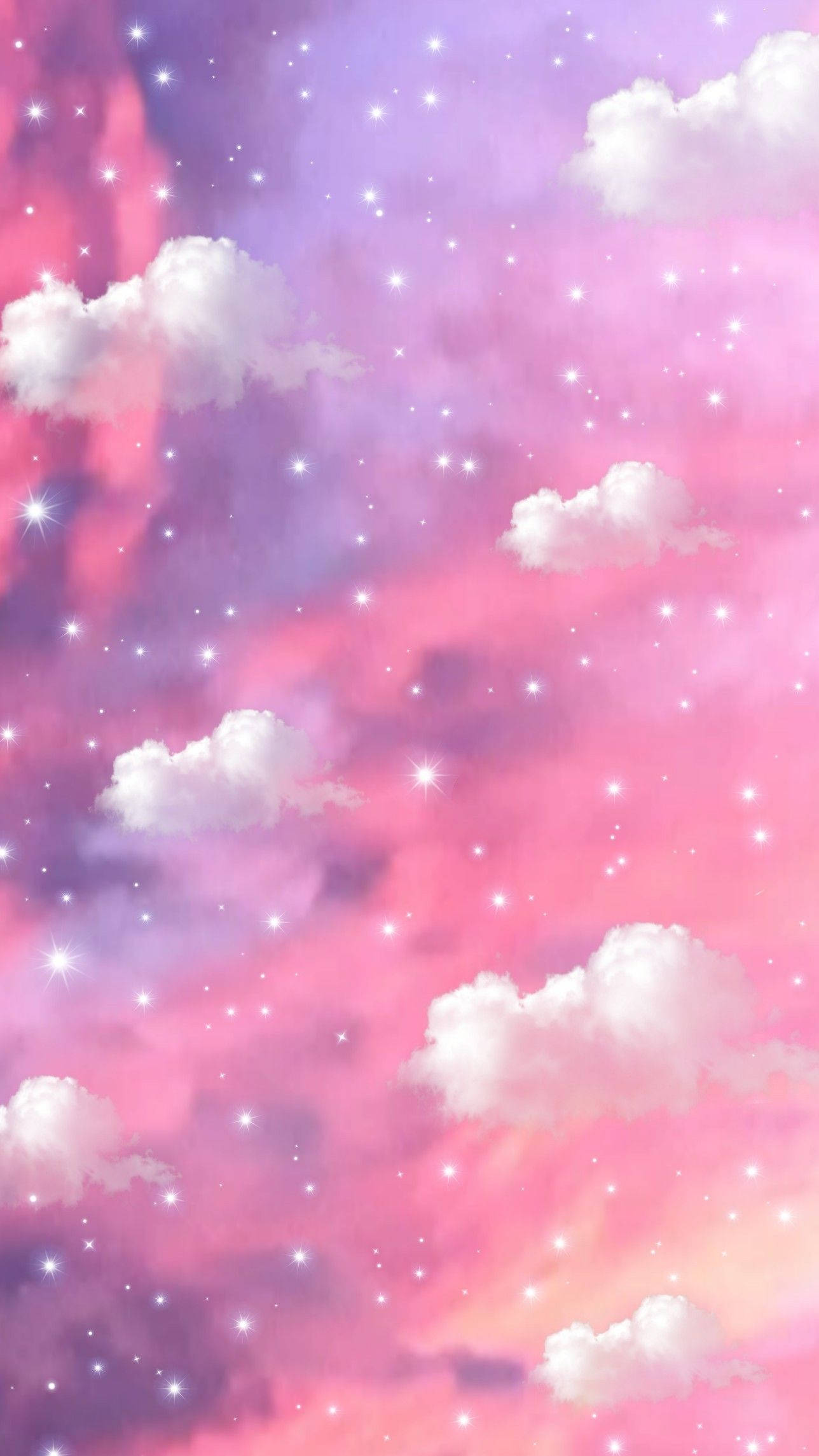 Girly Galaxy 桌布 壁紙 — 柔和的粉紅色和紫色雲朵在星光閃爍的天空下飄浮，散發著天體的光芒。