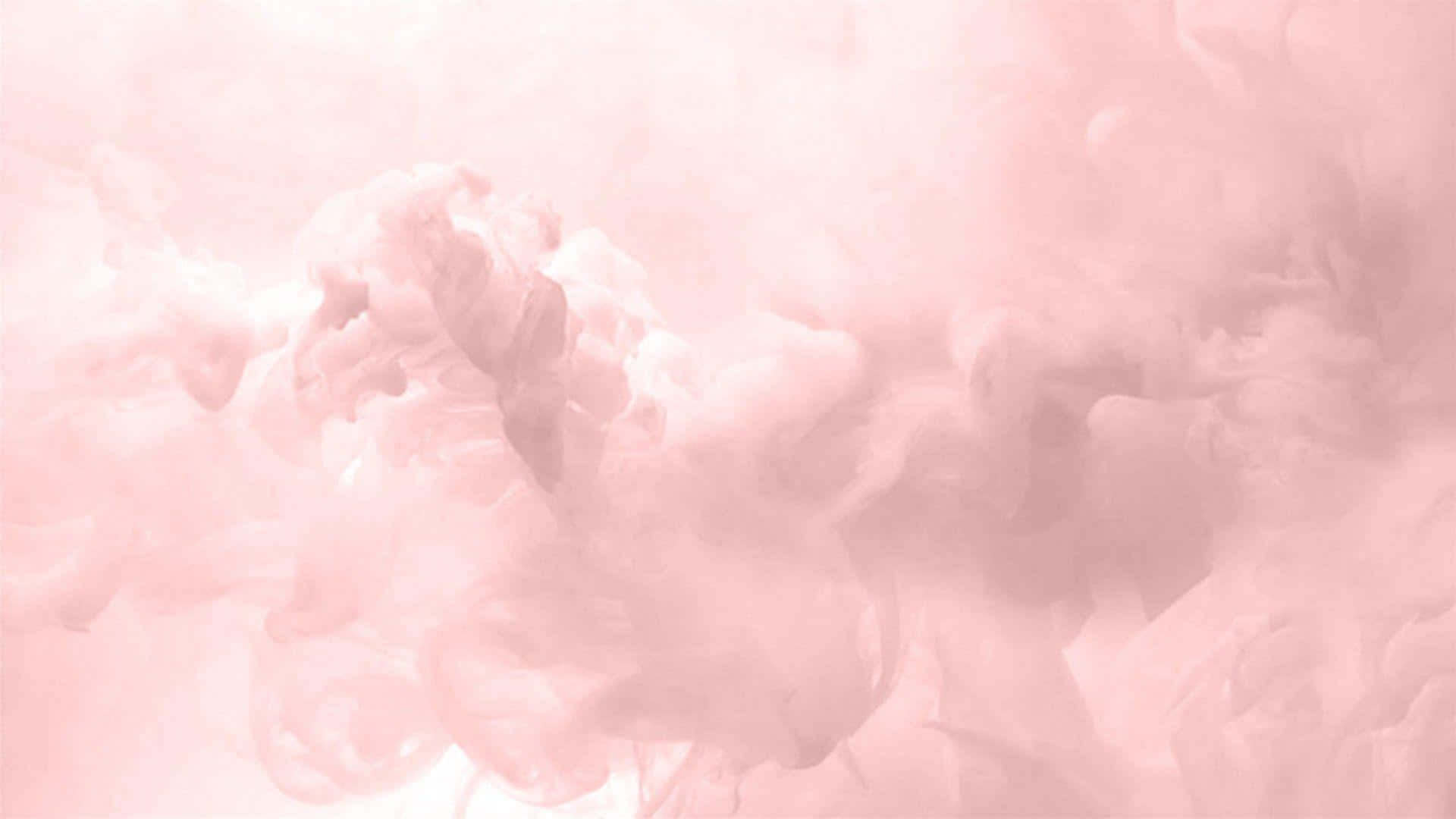 Rose Gold Desktop 桌布 壁紙 — 柔和的粉紅色墨水漩渦在清水中輕輕擴散，營造出夢幻飄逸的抽象圖案。