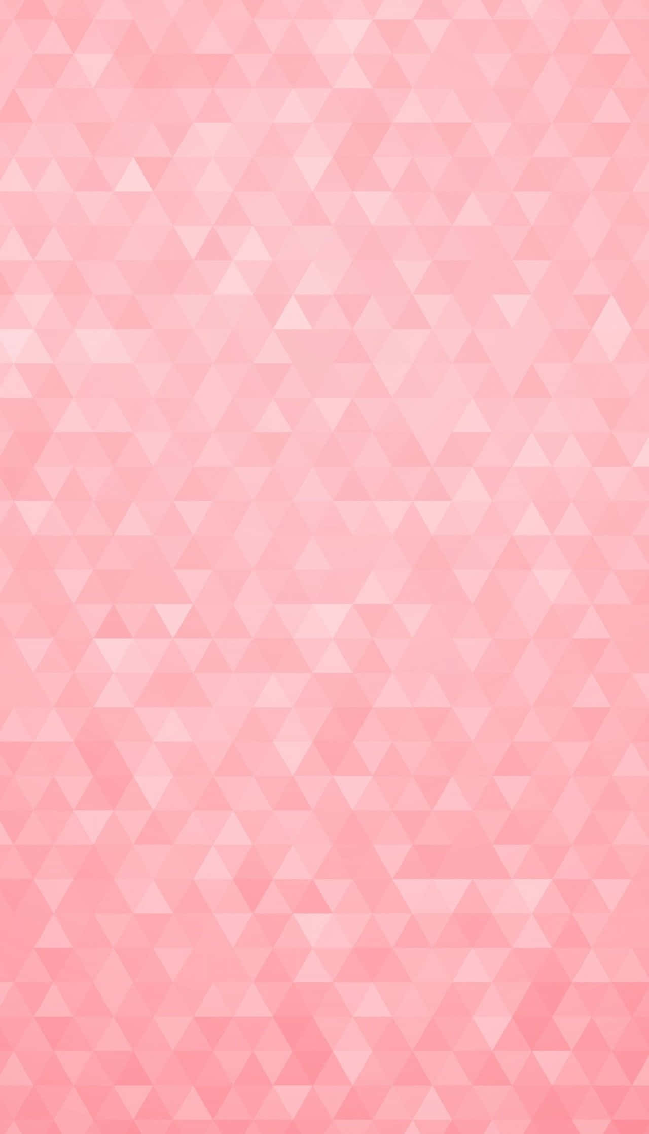 Pink Pastel 桌布 壁紙 — 柔和的粉紅色幾何壁紙，由不同色調的重疊三角形組成，營造出柔和的漸變效果。