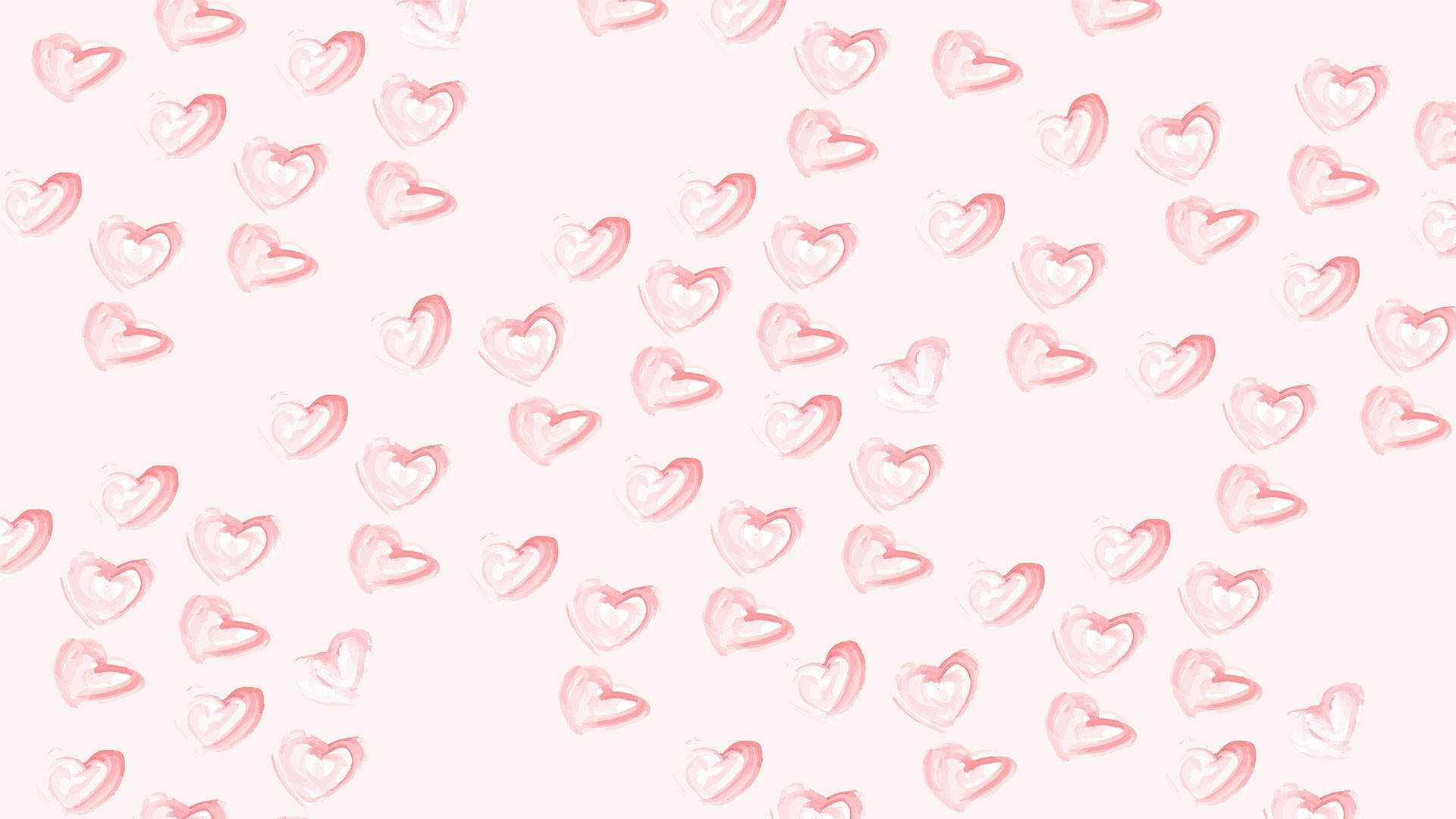 Aesthetic Heart 桌布 壁紙 — 柔和的粉紅色水彩心形在淡粉紅色的背景上以分散的圖案輕輕漂浮。