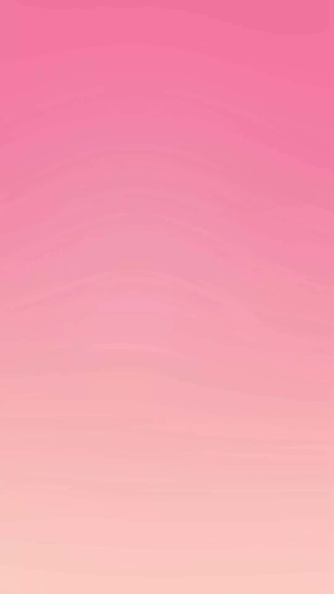 Simple Pink 桌布 壁紙 — 柔和的粉紅色漸變從深玫瑰色到淡蜜桃色，在寧靜的抽象水洗中輕輕流動。