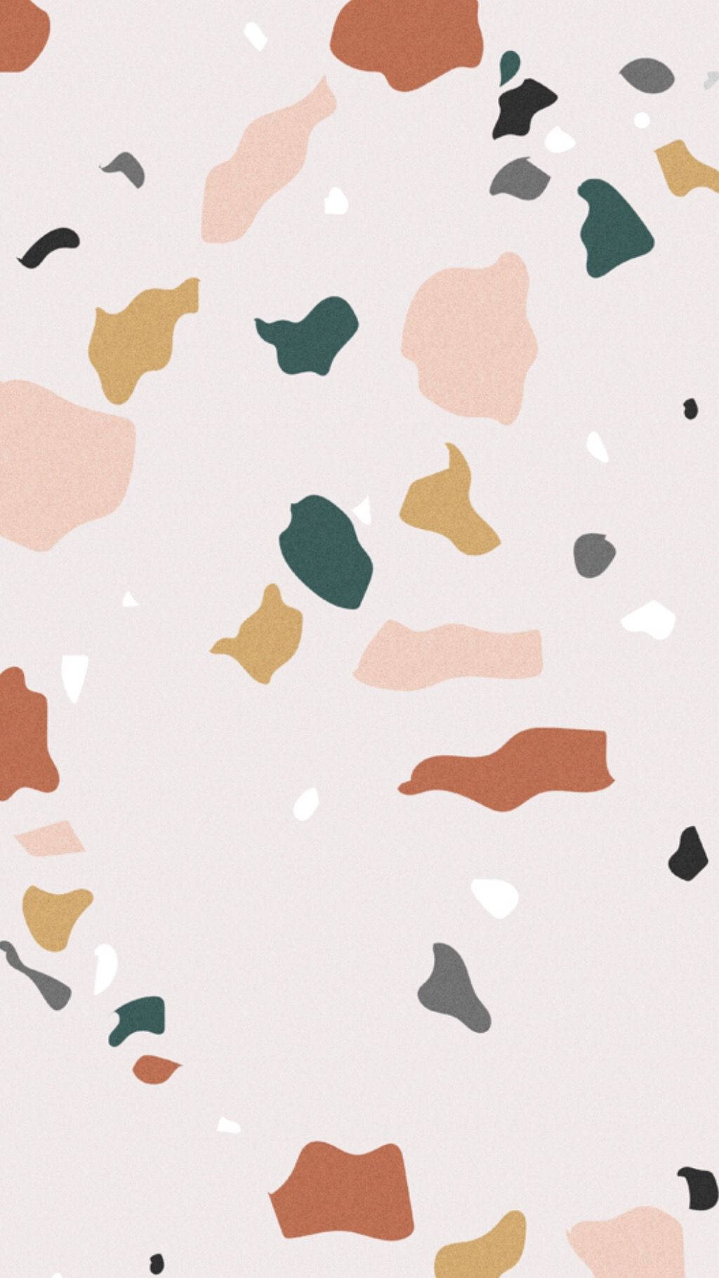 抽象水磨石圖案，帶有柔和粉紅色背景和大地色斑點。