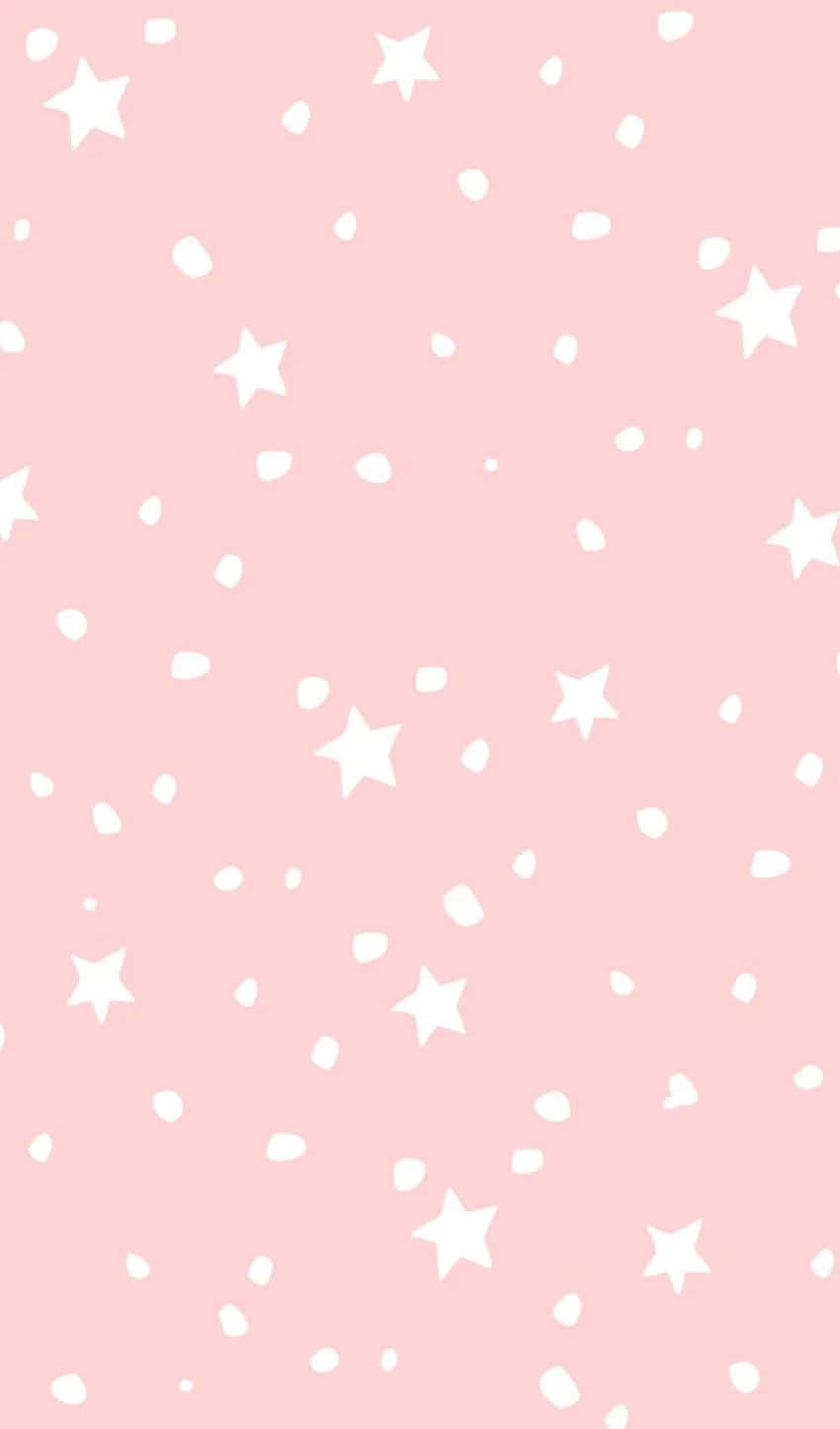 Stars 桌布 壁紙 — 柔和的粉紅色背景，點綴著散落的白色星星和圓點，營造出夢幻的天體圖案。