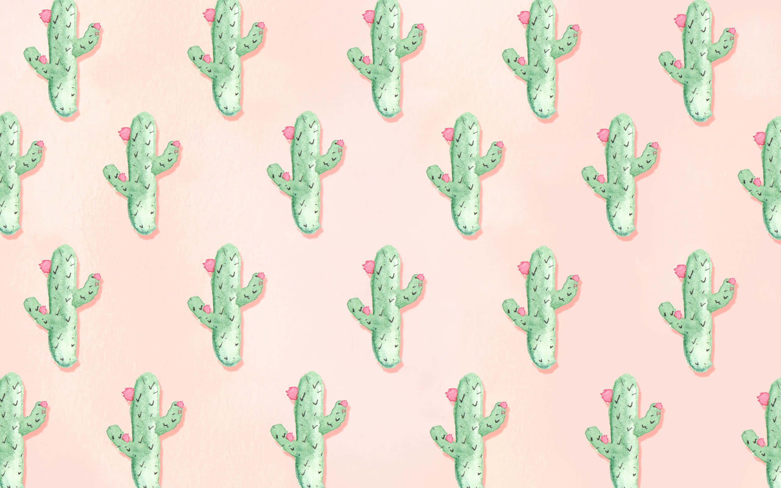 Cute Cactus 桌布 壁紙 — 柔和的粉紅色背景上裝飾著重複的可愛綠色仙人掌，每個仙人掌頂部都有細小的粉紅色花朵。