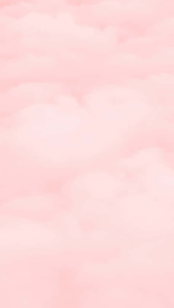 Simple Pink 桌布 壁紙 — 柔和的粉紅色雲朵輕輕飄過夢幻的天空，沒有尖銳的邊緣或明確的形狀。