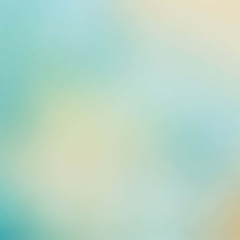 抽象 桌布 壁紙 — 柔和的粉綠與奶油色漸變，營造出夢幻空靈的背景，色彩過渡溫柔。