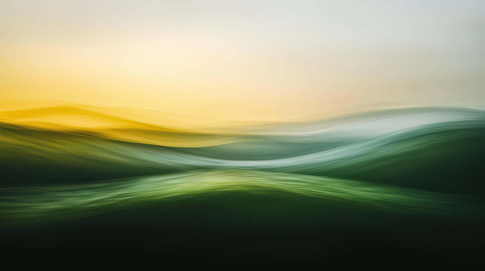 Abstract landscape with flowing green and yellow hues at dawn. 壁紙 — 柔和的綠色和黃色流動波浪融合成一個寧靜的抽象景觀，帶有漸變照明。