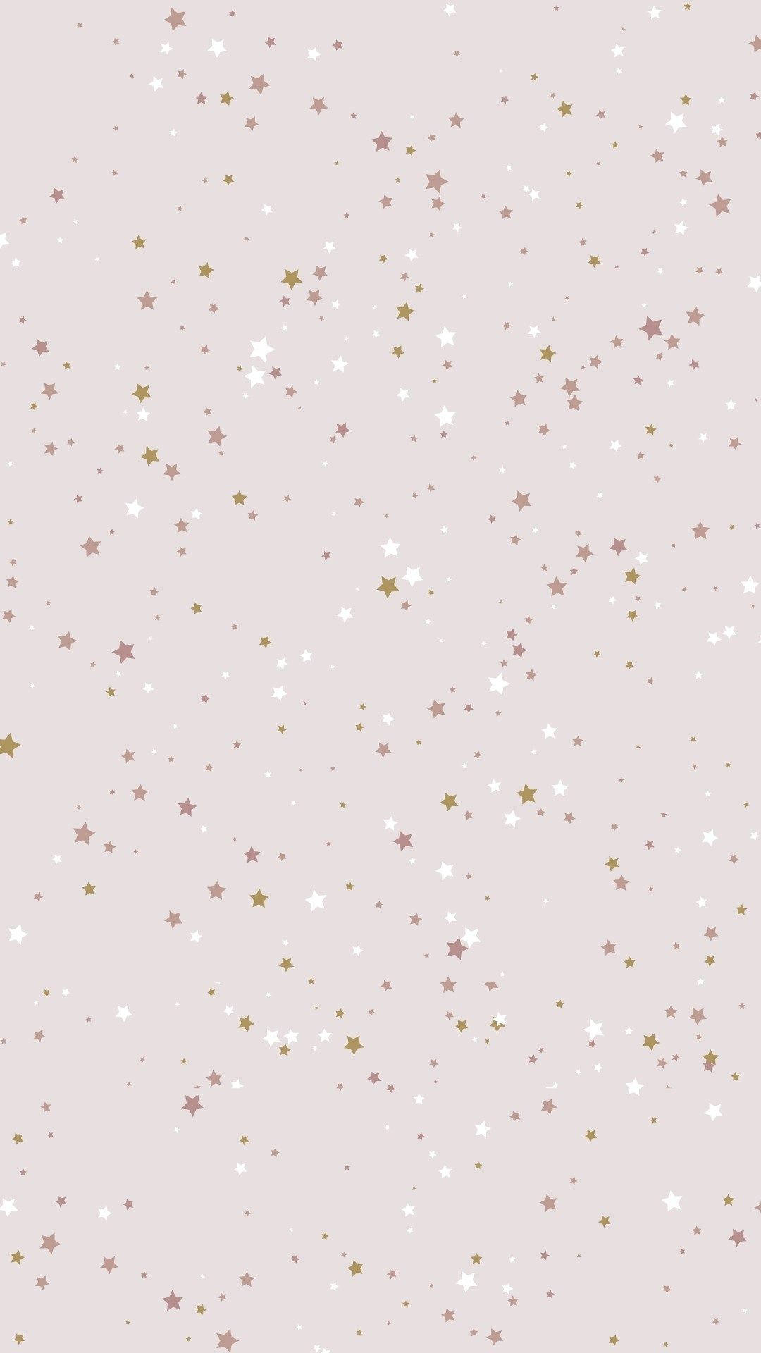 Stars 桌布 壁紙 — 柔和的腮紅色背景上散落著細小的白色和金色星星，營造出夢幻的天體圖案。