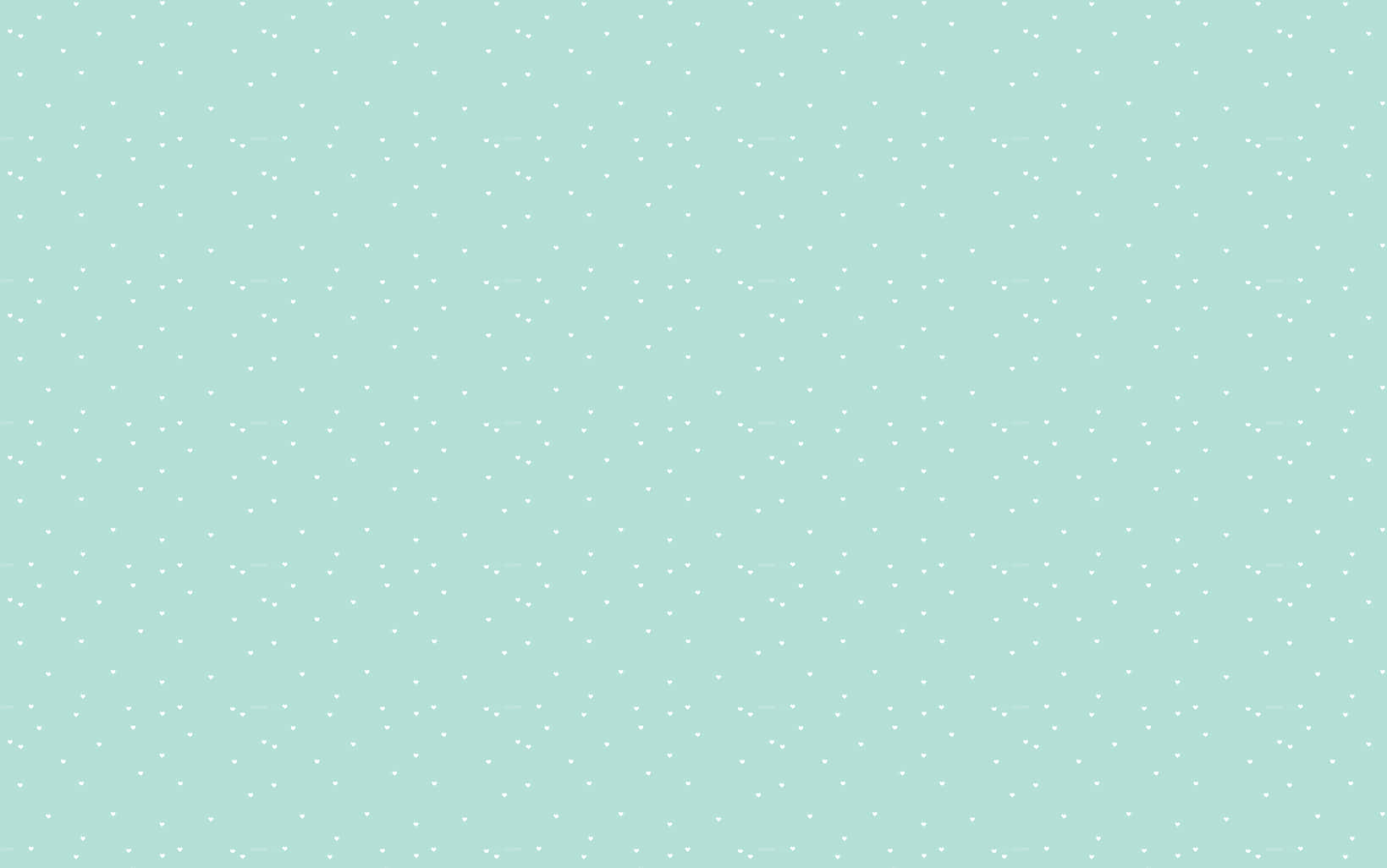 Polka Dot 桌布 壁紙 — 柔和的薄荷綠色背景上點綴著細小的白色斑點，營造出溫和的極簡圖案。