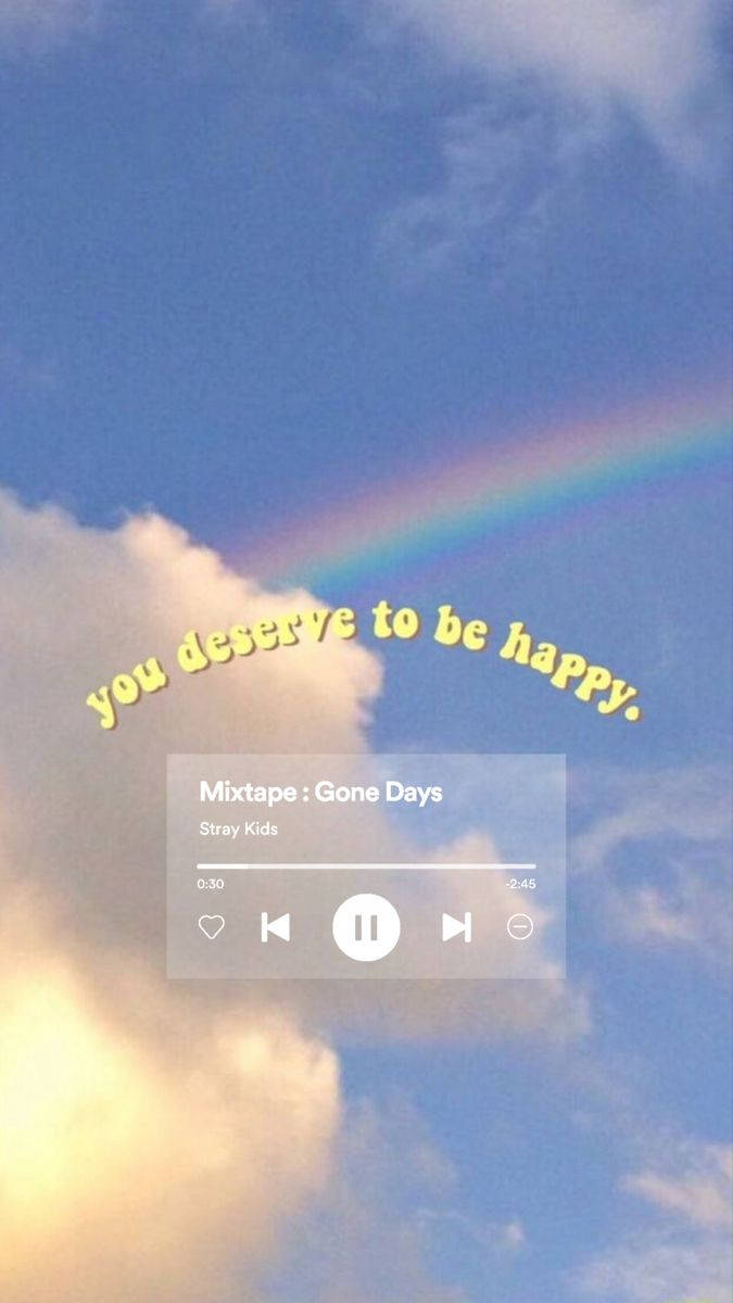 Music Aesthetic 桌布 壁紙 — 柔和的藍天，有蓬鬆的雲和彩虹，拱起在一個顯示「you deserve to be happy.」的音樂播放器疊加層上。