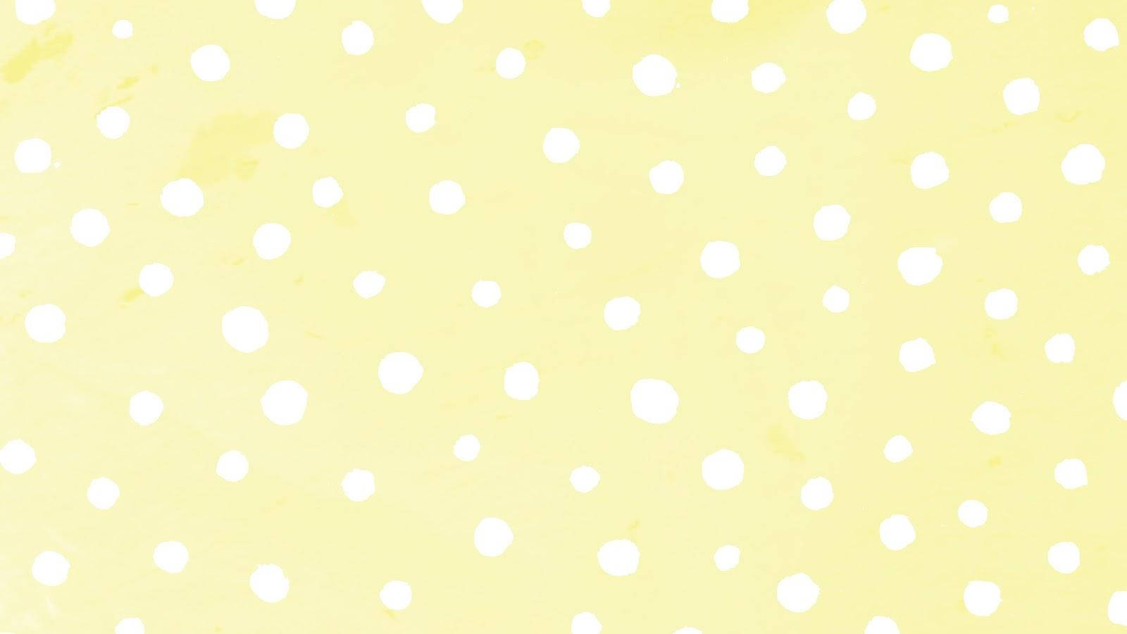 美感電腦 桌布 壁紙 — 柔和的黃色背景，帶有手繪水彩風格的白色圓點。