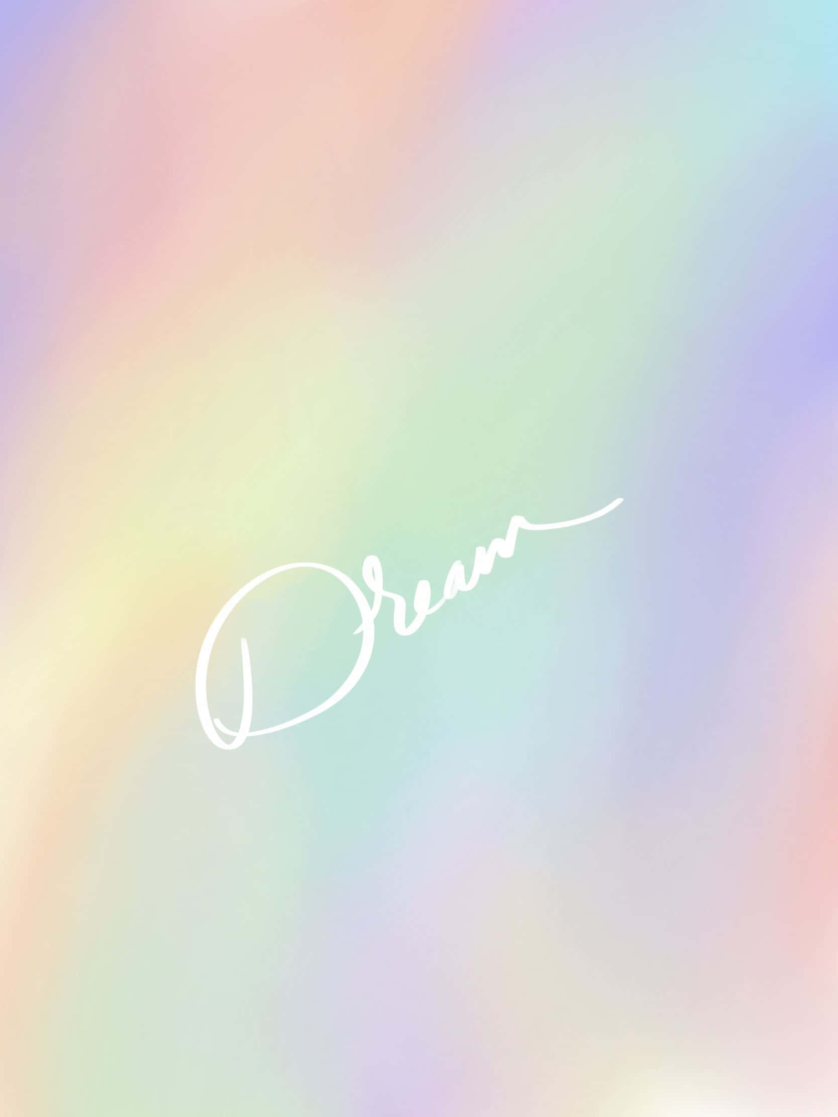 桌布 壁紙 — 柔和粉彩彩虹漸變背景，中央有優雅白色草書字體 'Dream'。