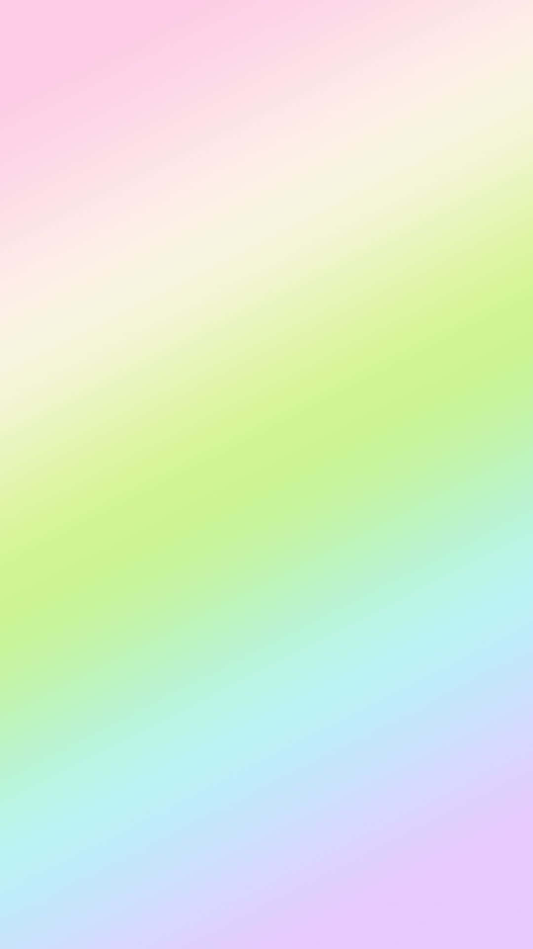 Spring Pastel 桌布 壁紙 — 柔和粉彩漸層壁紙，以對角線條從粉紅色過渡到綠色、藍色和紫色。