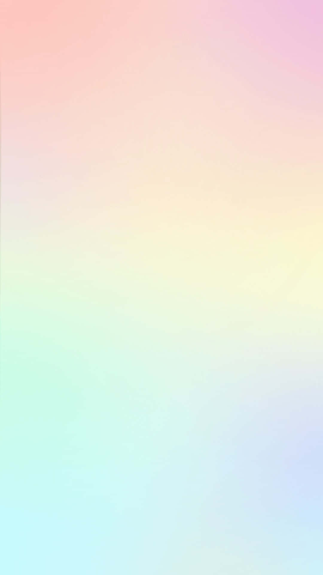 Pastel Gradient 桌布 壁紙 — 柔和粉彩漸層壁紙，融合蜜桃色、粉紅色、黃色、薄荷色和薰衣草色調，呈現流暢無縫的過渡效果。